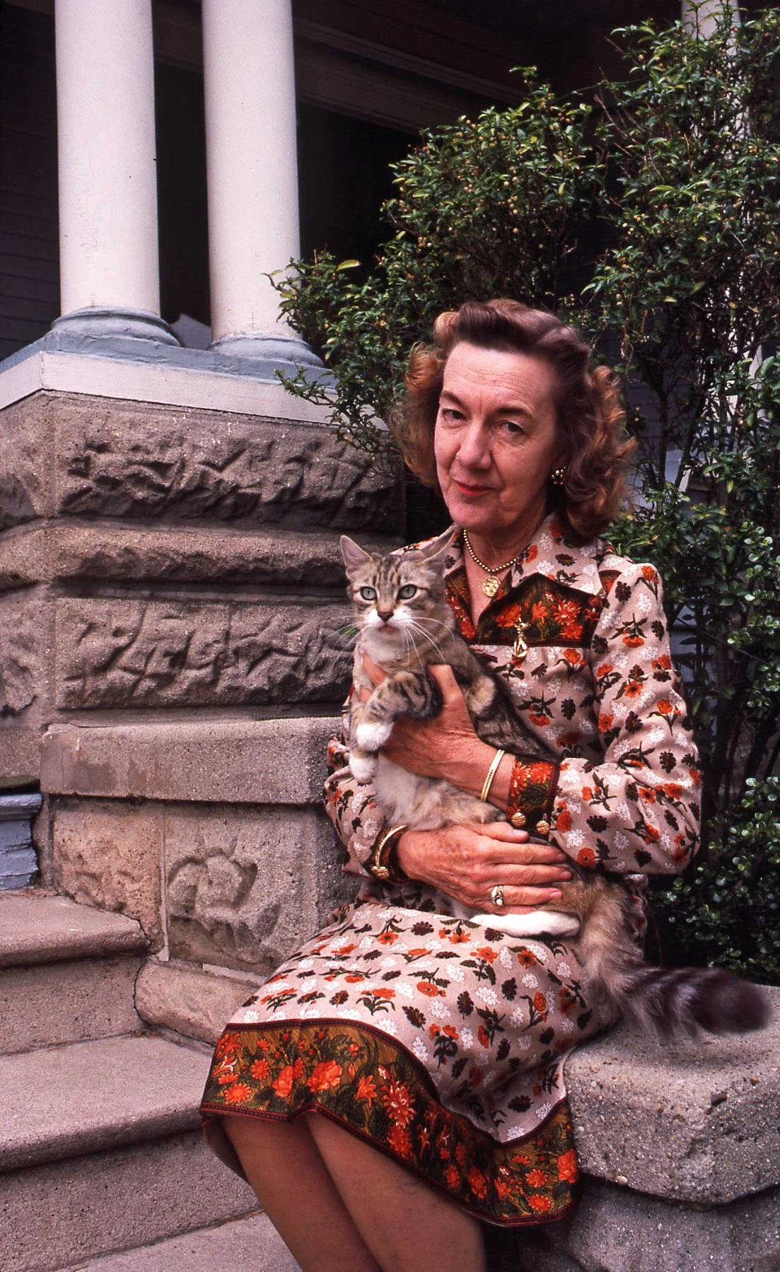 Dorothy Rankin Bembridge on the drive way with cat