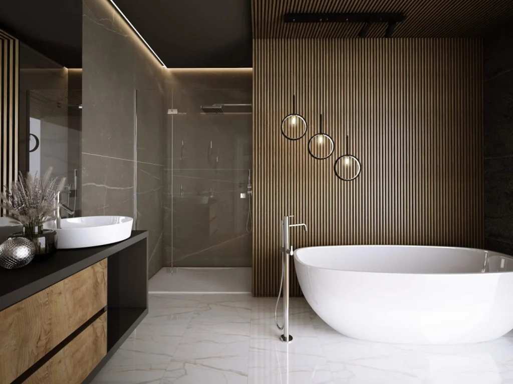 Modern bathroom with a freestanding bathtub, wooden accent wall, round mirrors, and a glass-enclosed shower.