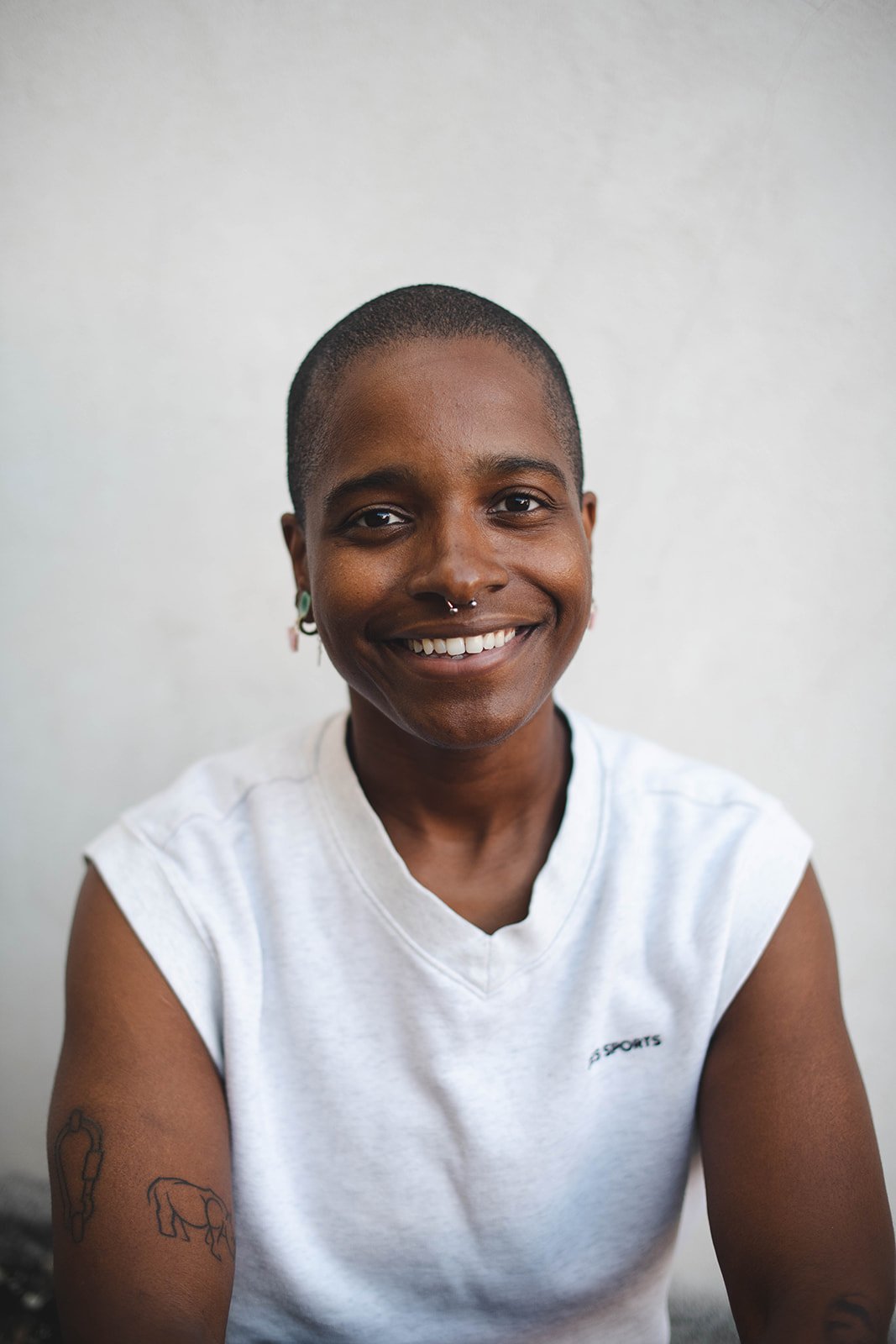 portrait photo of a trans, queer and black therapist.