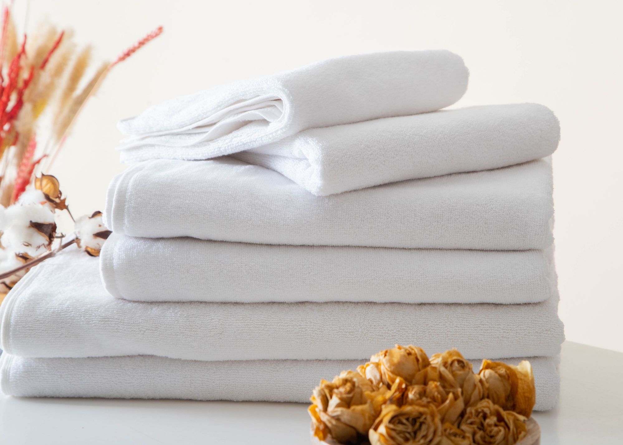 Fresh folded towels prepared for vacation rental guests.