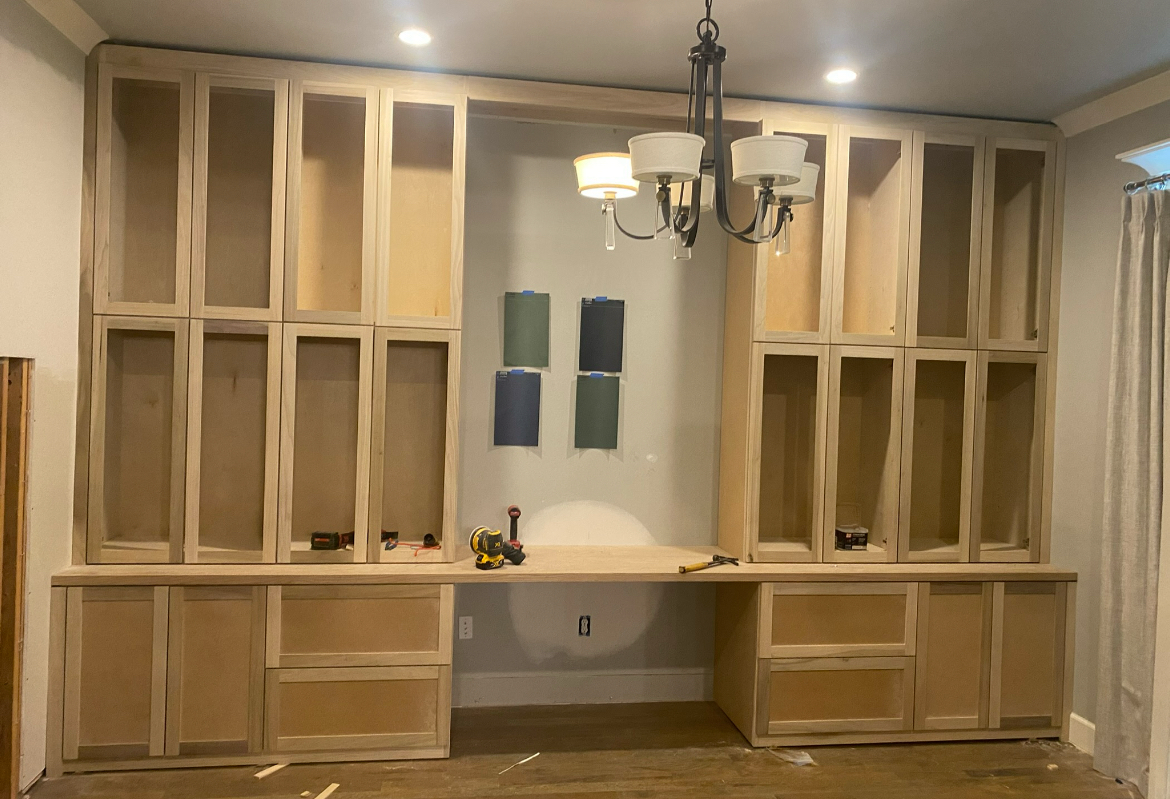 Partially constructed wooden built-in cabinet