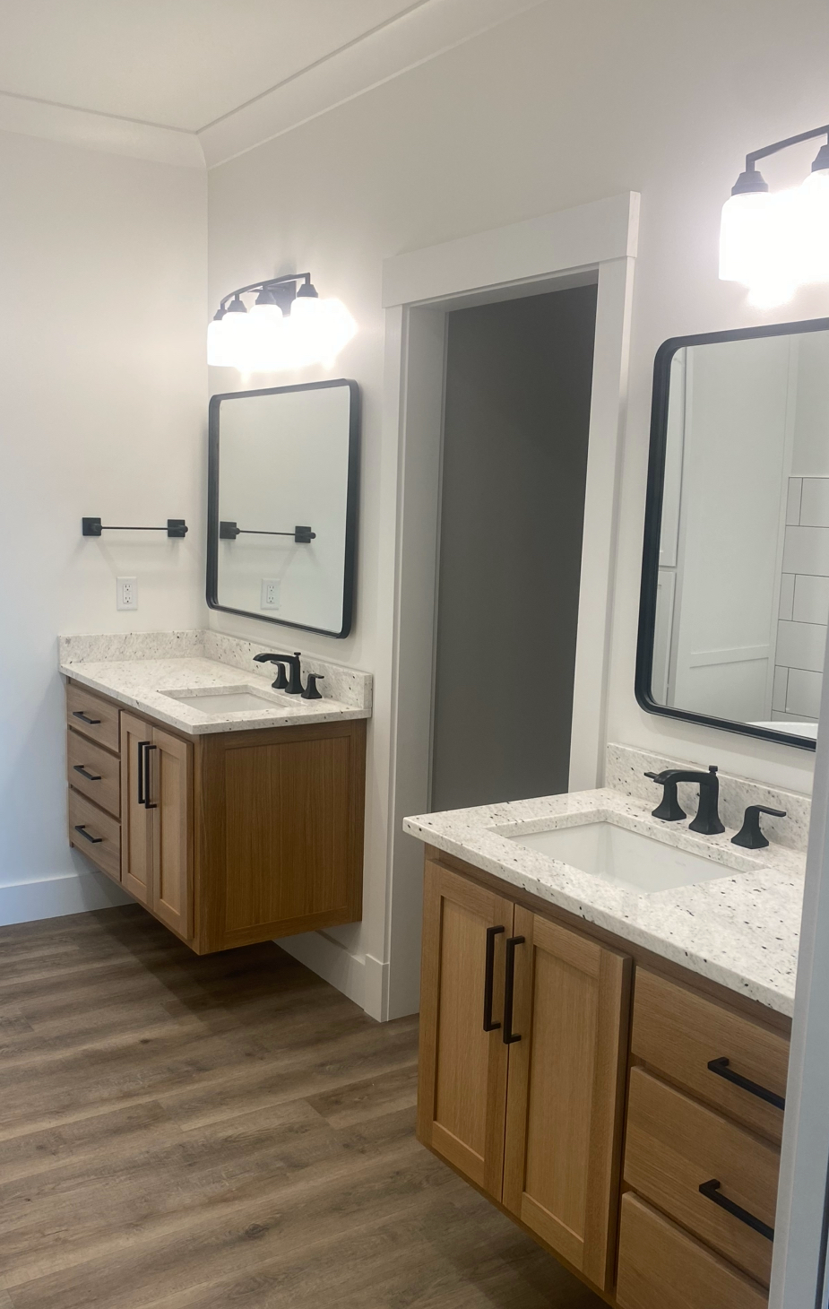 Two Bathroom vanities with custom hardware