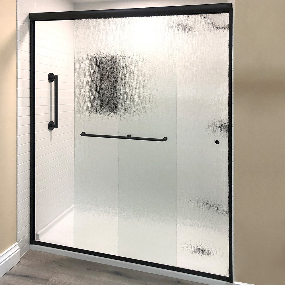 A modern shower with textured frosted glass doors, black frame,  and safety grab bar.