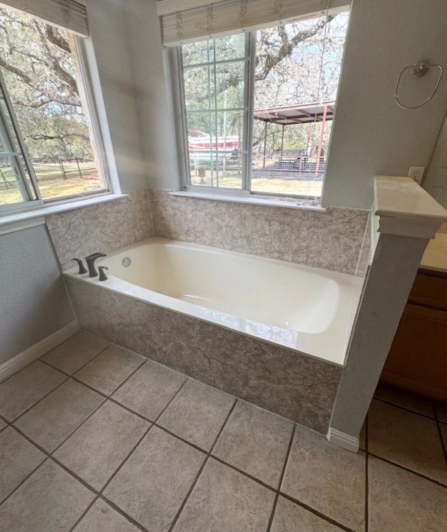 An acrylic wrapped bathtub.