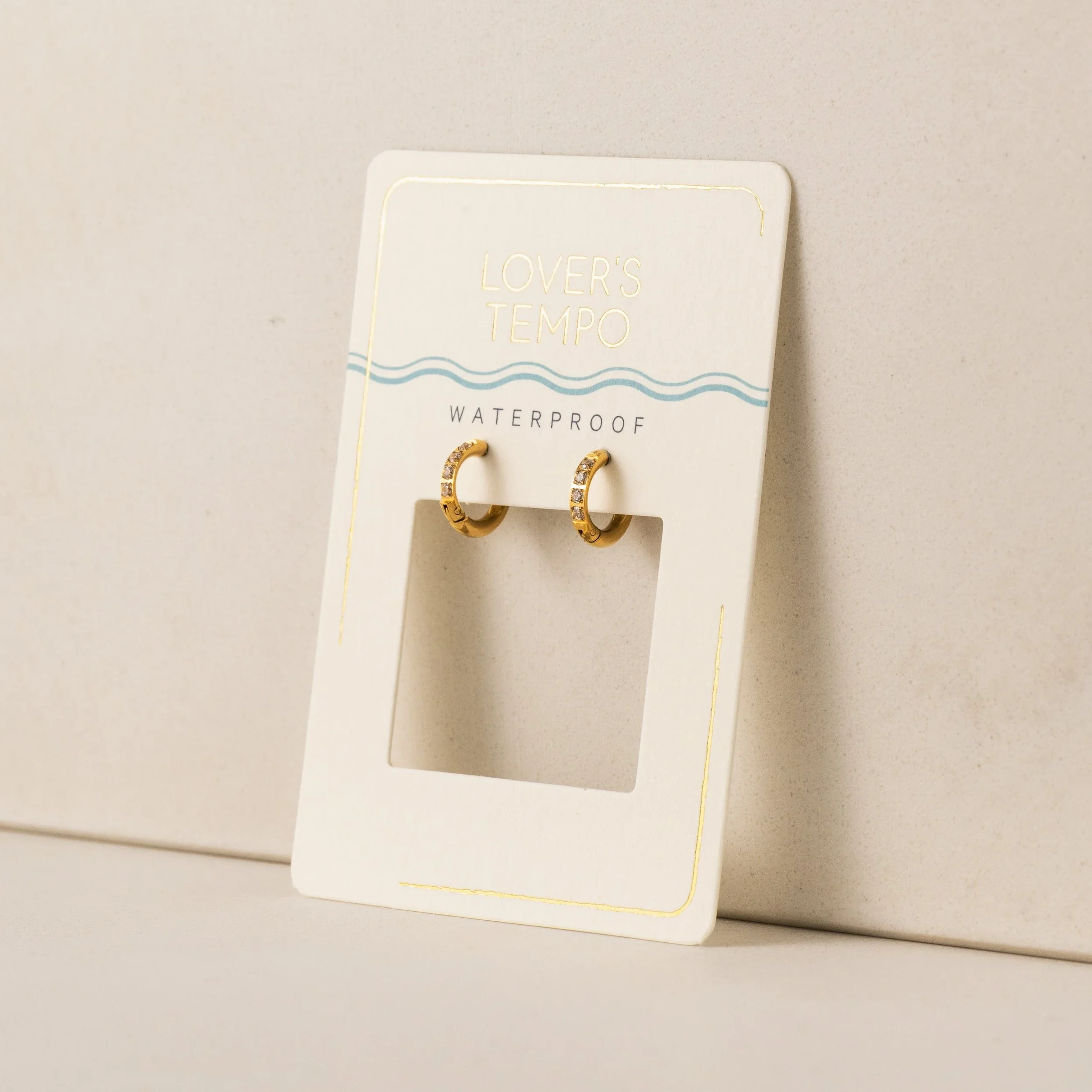 Evie 10mm Huggie Hoops_4.webp