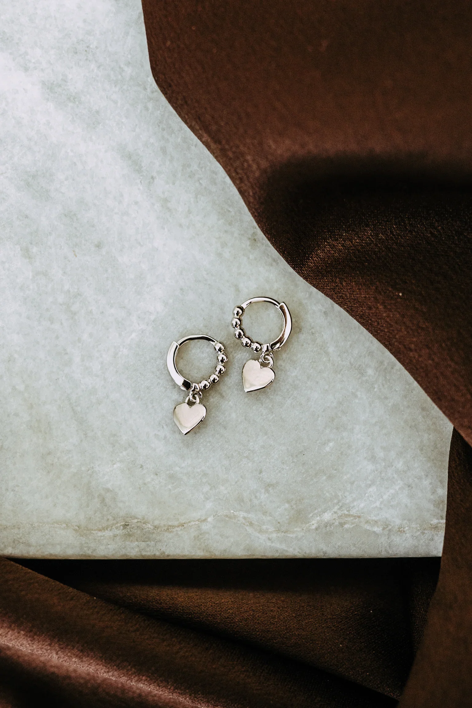 Silver Heart Charm Hoops_SRC 2.webp