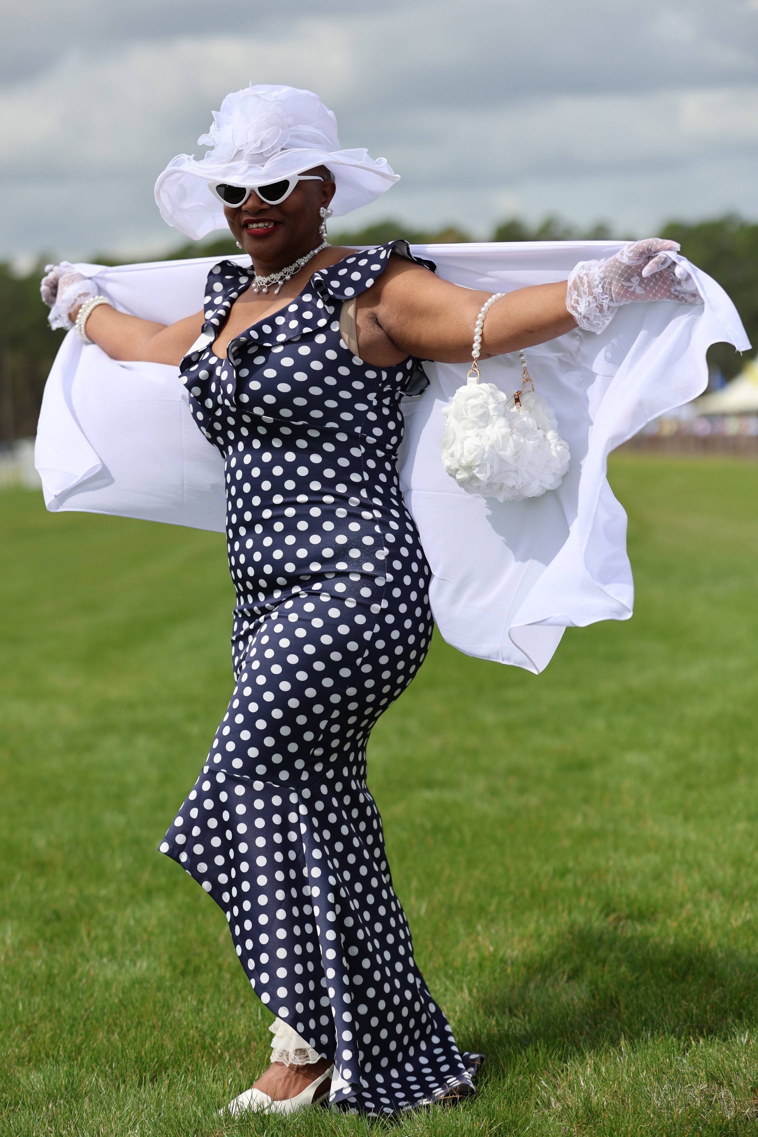 Joyce Wimbush, 56, of Charlotte NC, poses for a portrait as she attends her first cup to the Carolina Cup.