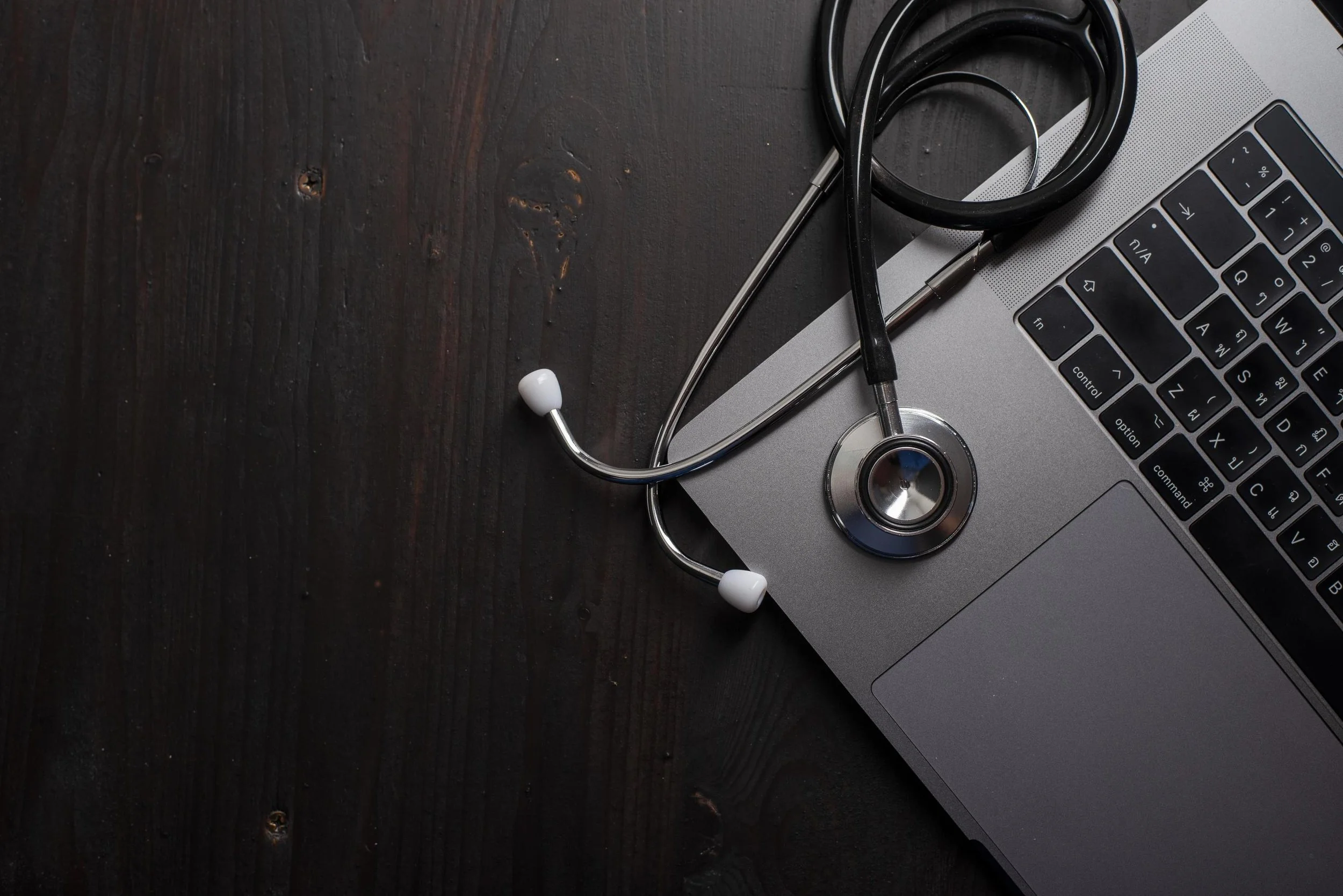 stethoscope-on-desk-with-books-free-photo.jpg