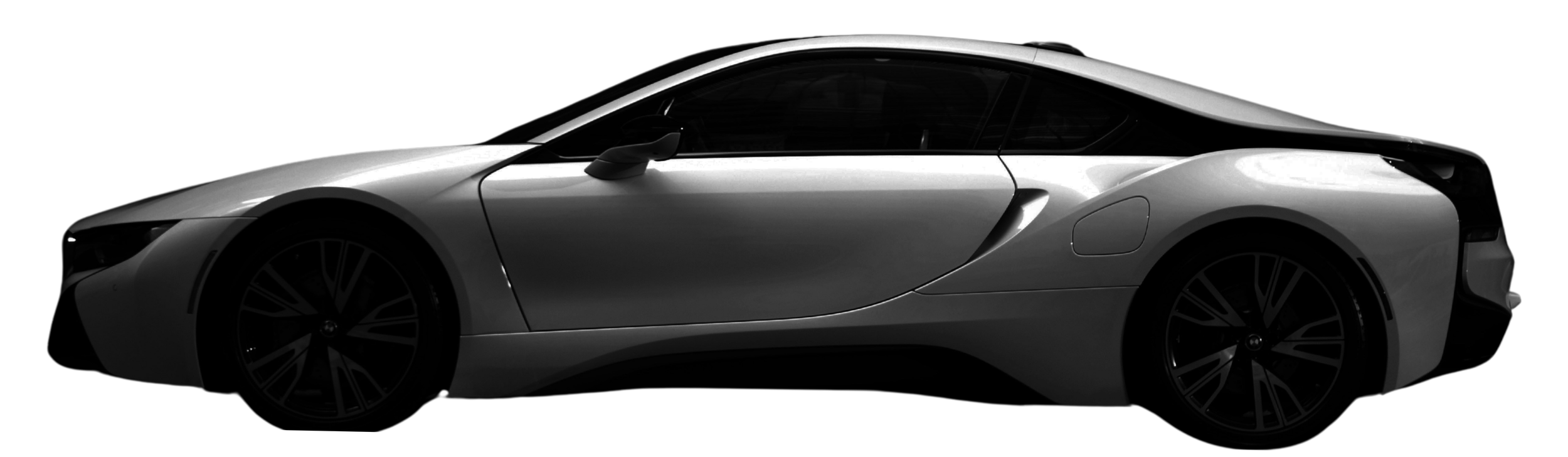 A sleek, modern sports car with a low profile and aerodynamic design, shown in a side view against a black background.