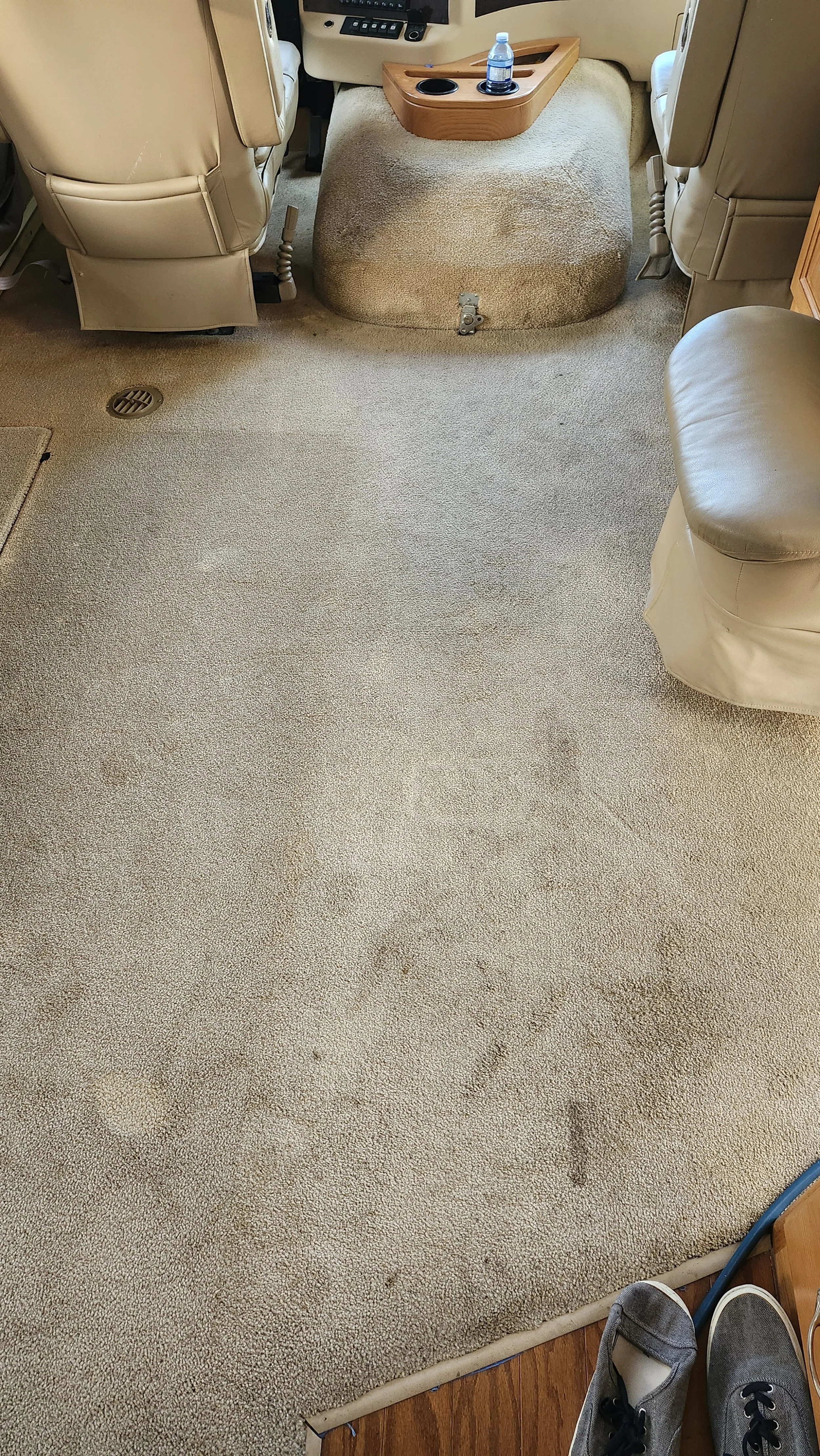 the before photo of dirty carpet in am RV