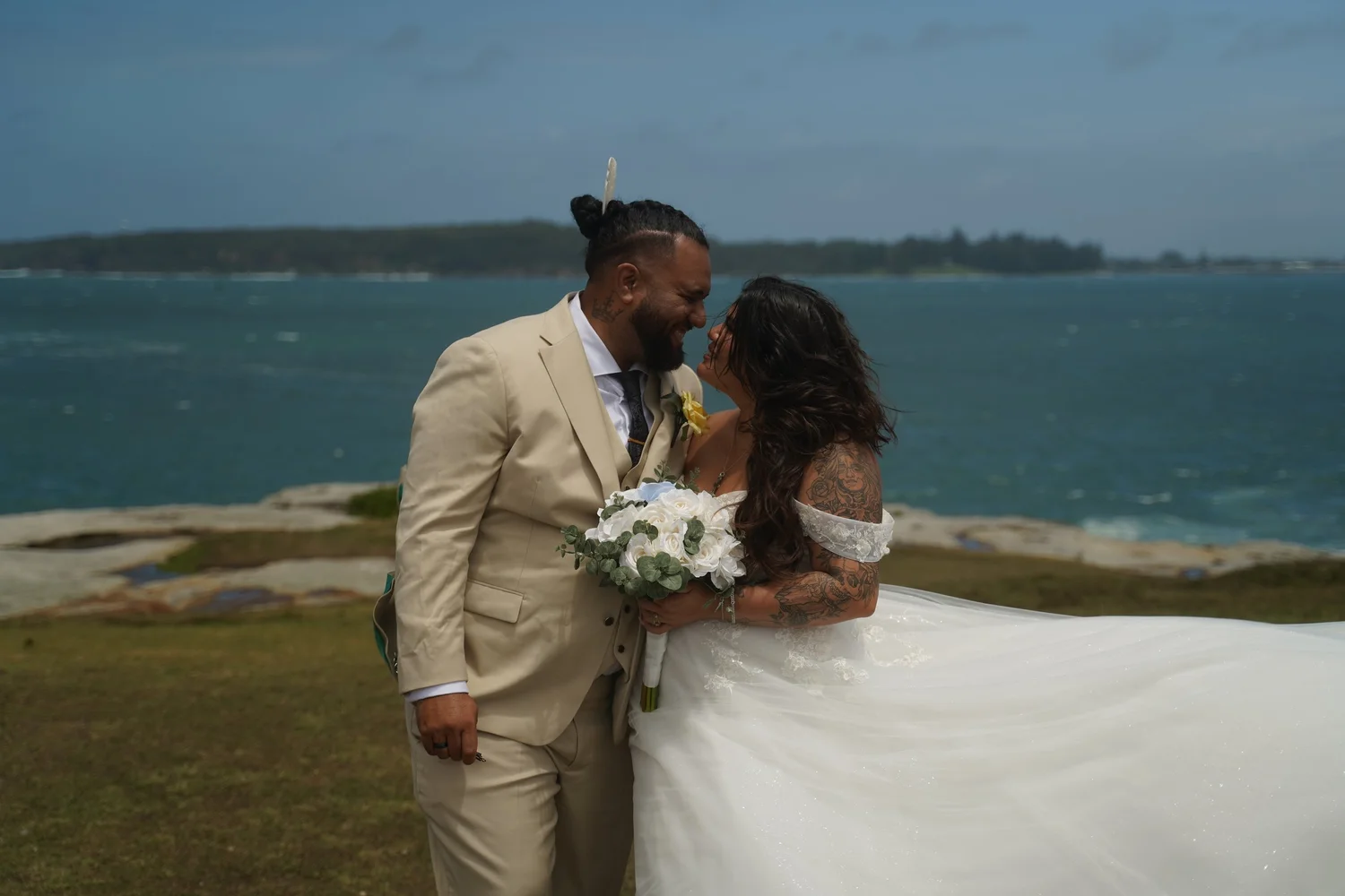 Couple embracing by the sea