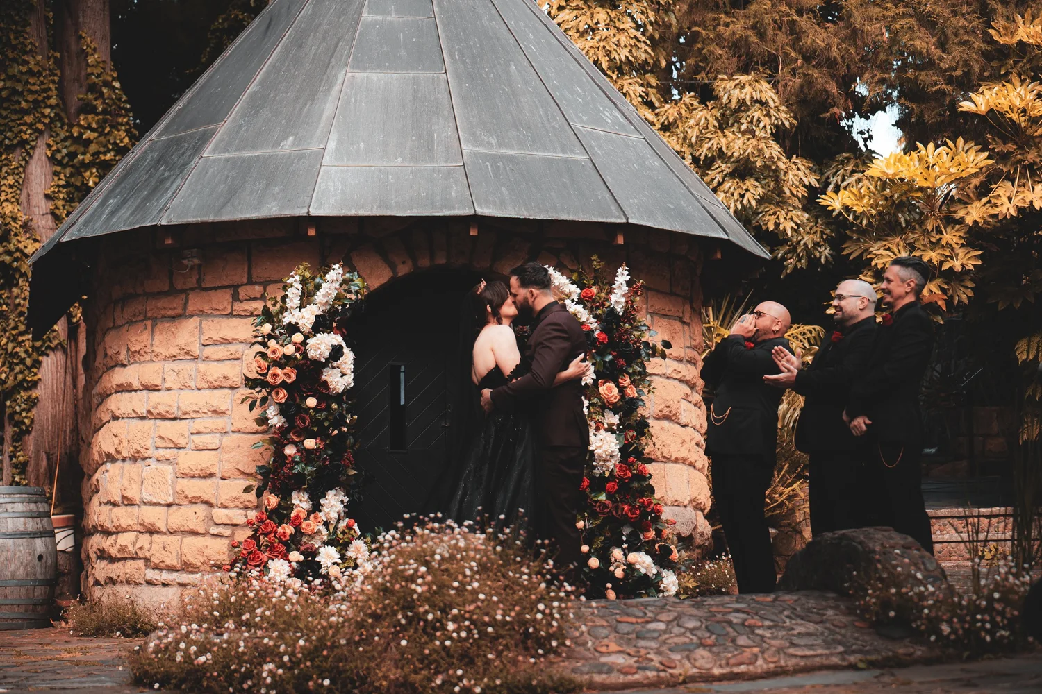 Ceremony outside a stone chapel