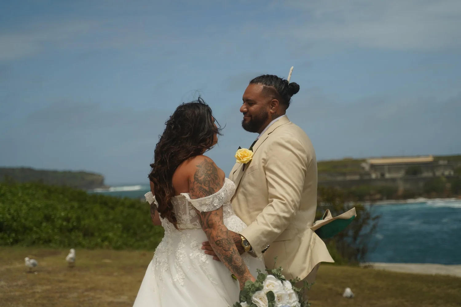 Couple kissing on the coast