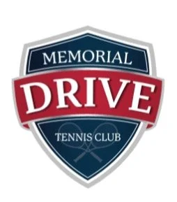 Memorial Drive Tennis Club logo with a shield design, featuring the words 'Memorial Drive' at the top, 'Tennis Club' at the bottom, and a red banner with 'Drive' across the middle.