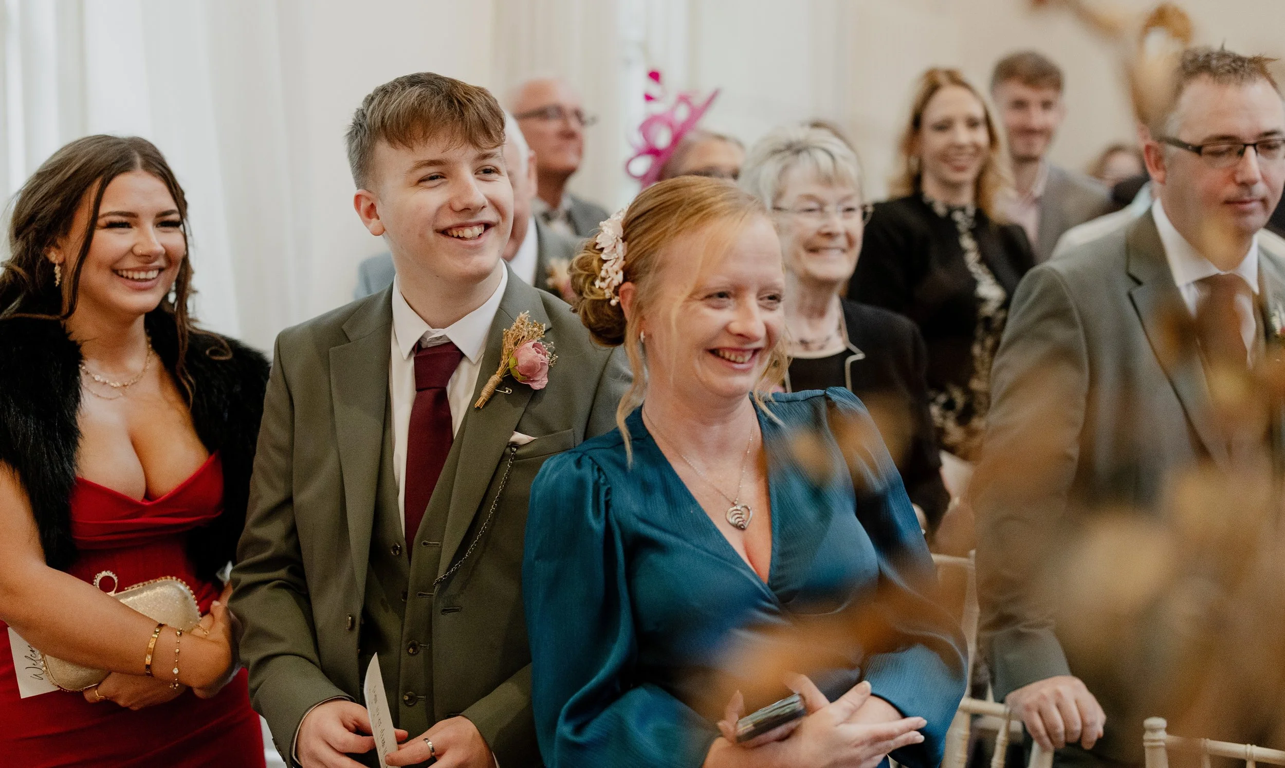 leicestershire-autumn-wedding-ceremony-guests-cheering.jpg