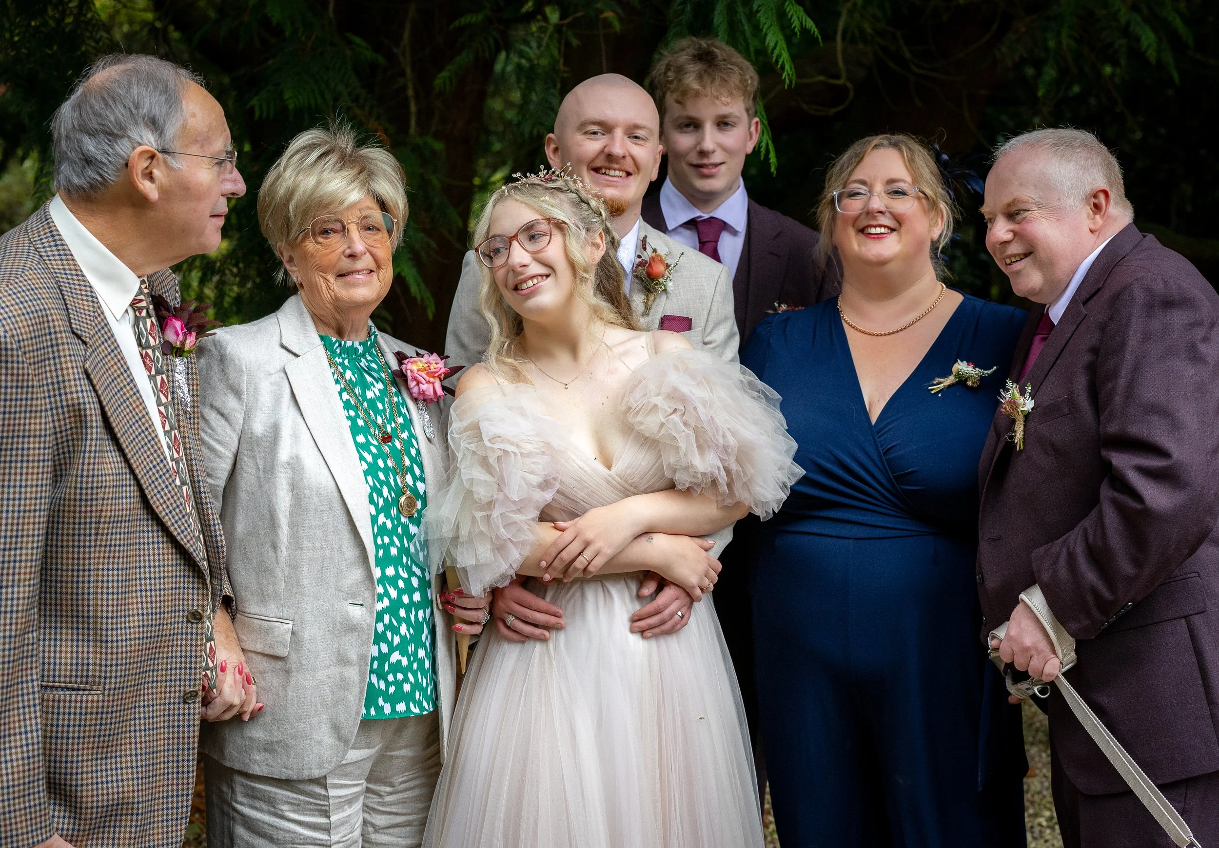 newly-married-couple-with-close-family.jpg