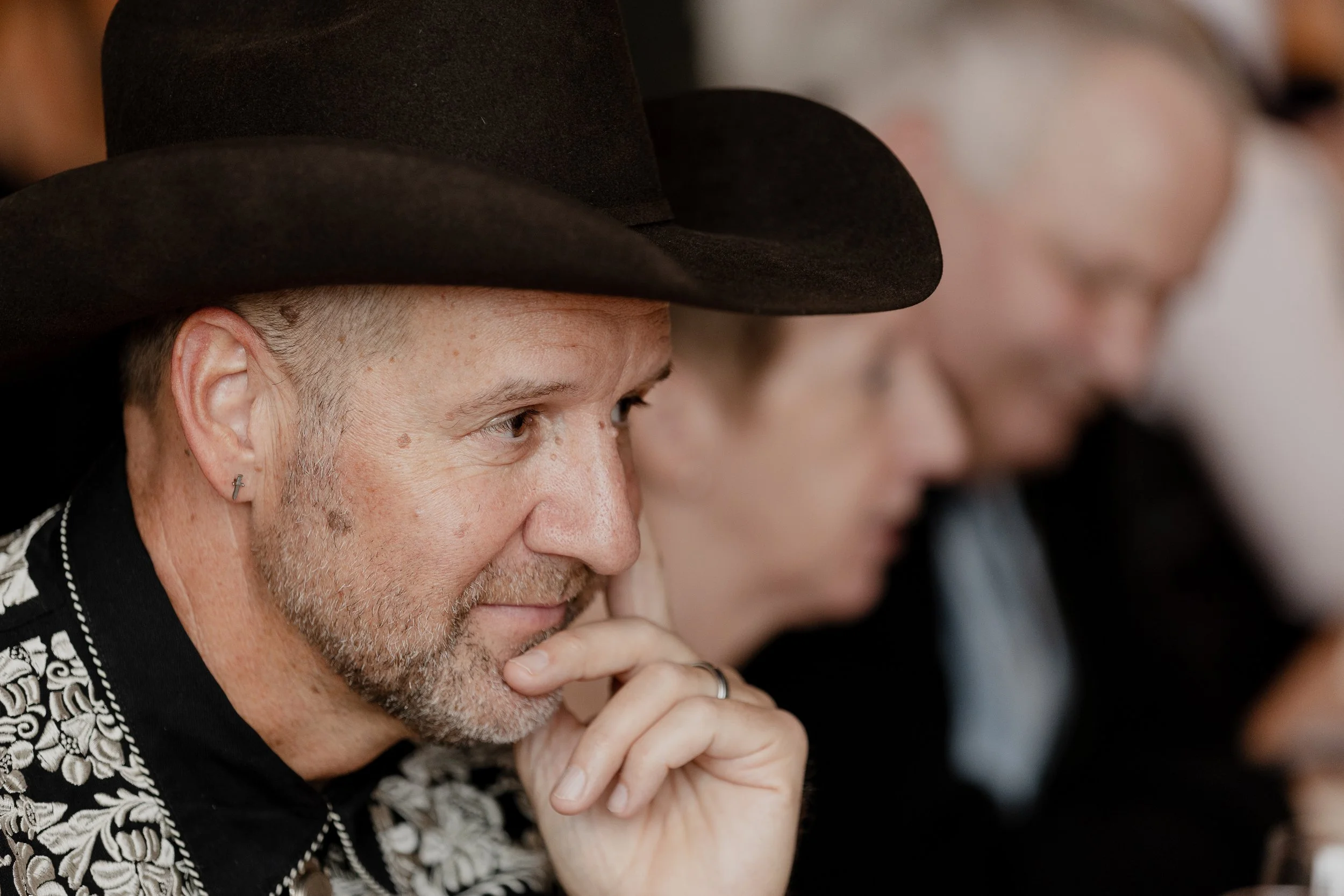wedding-guest-contemplating-during-speeches.jpg