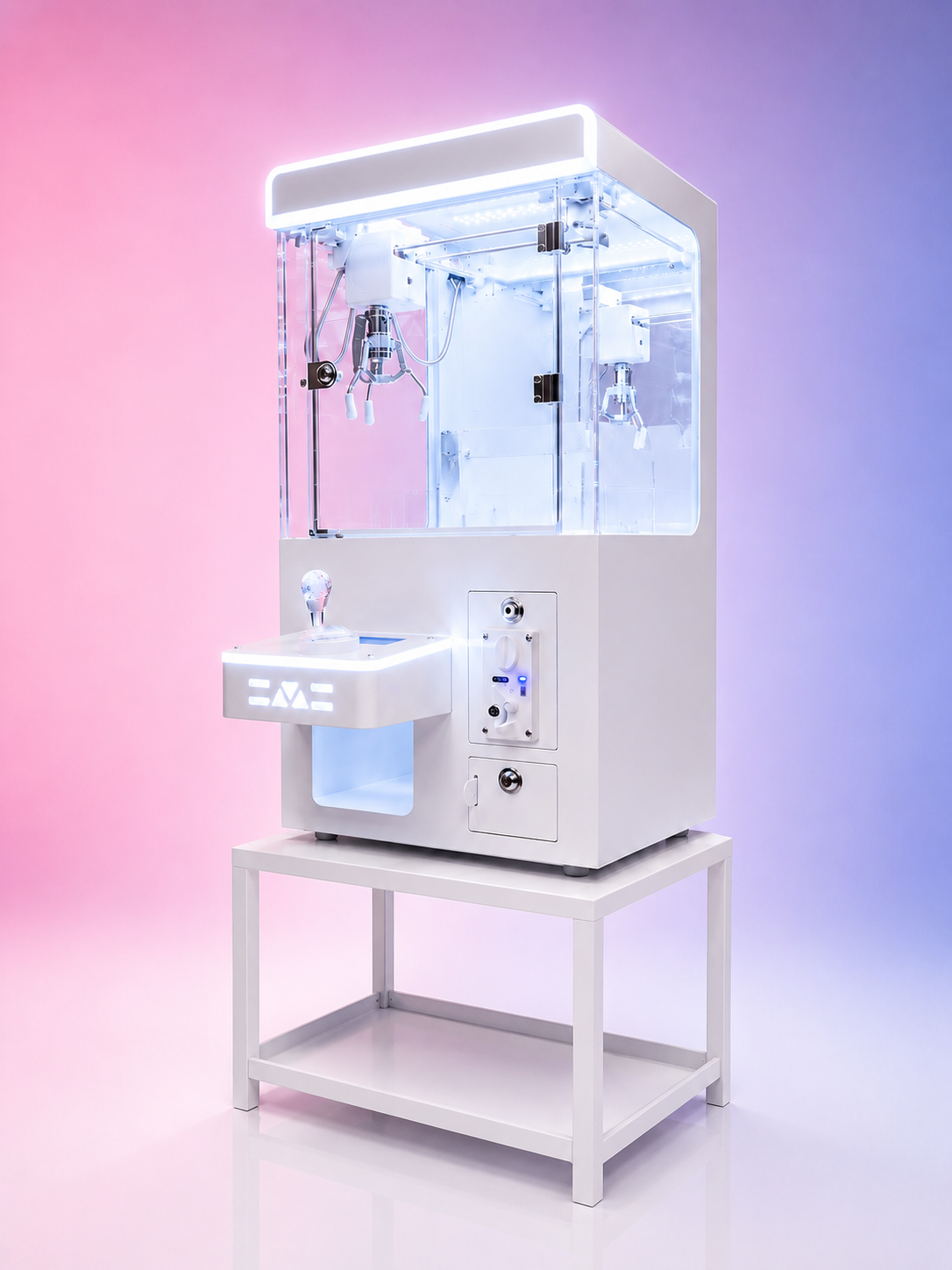 A white modern arcade-style claw crane machine with a transparent glass enclosure, a joystick, and a prize compartment, set against a gradient pink and purple background.