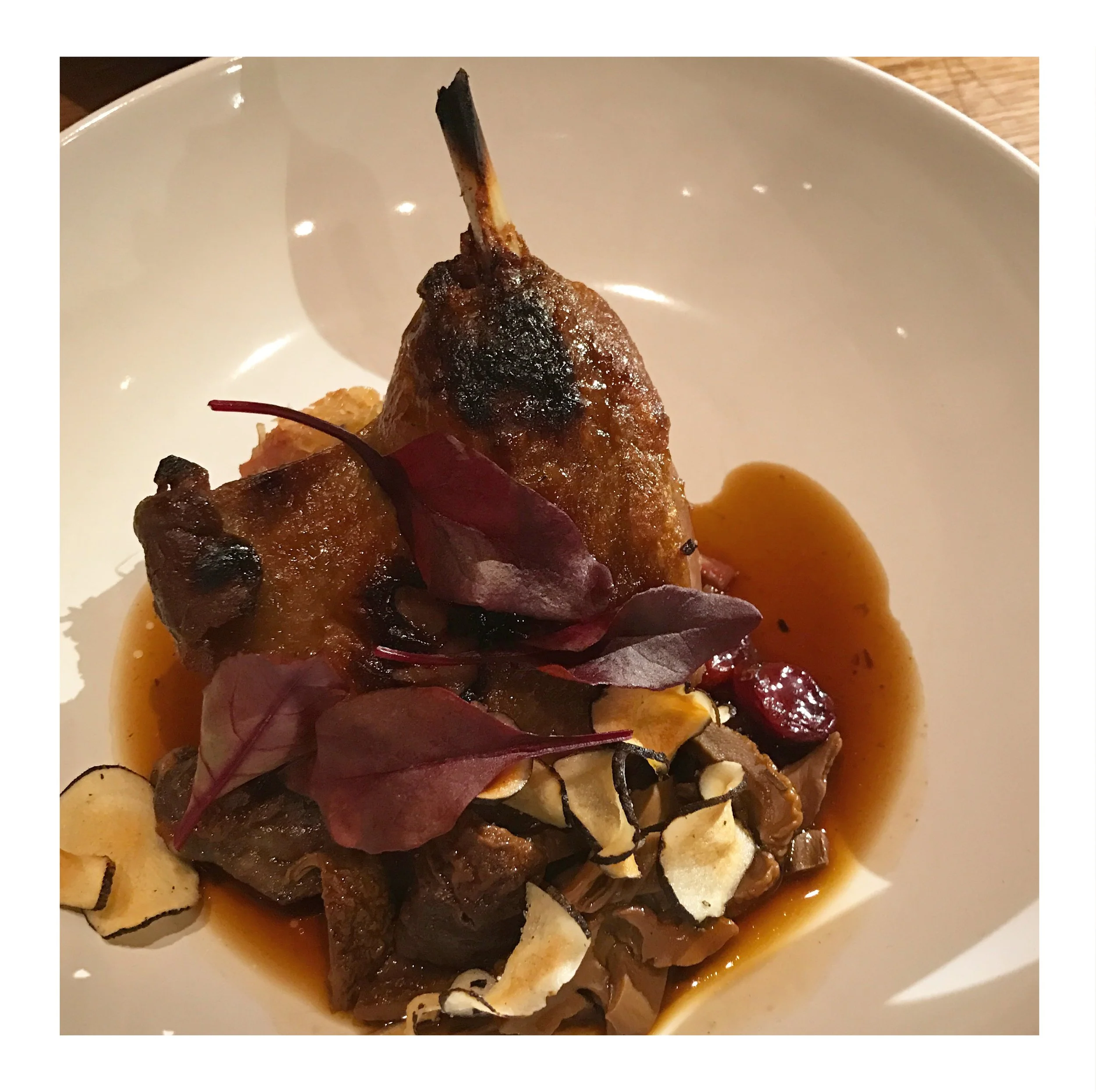 Slow-cooked seasonal meat dish with vegetables and sauce, prepared for Chef Adrienne’s home-hosted dining menu.