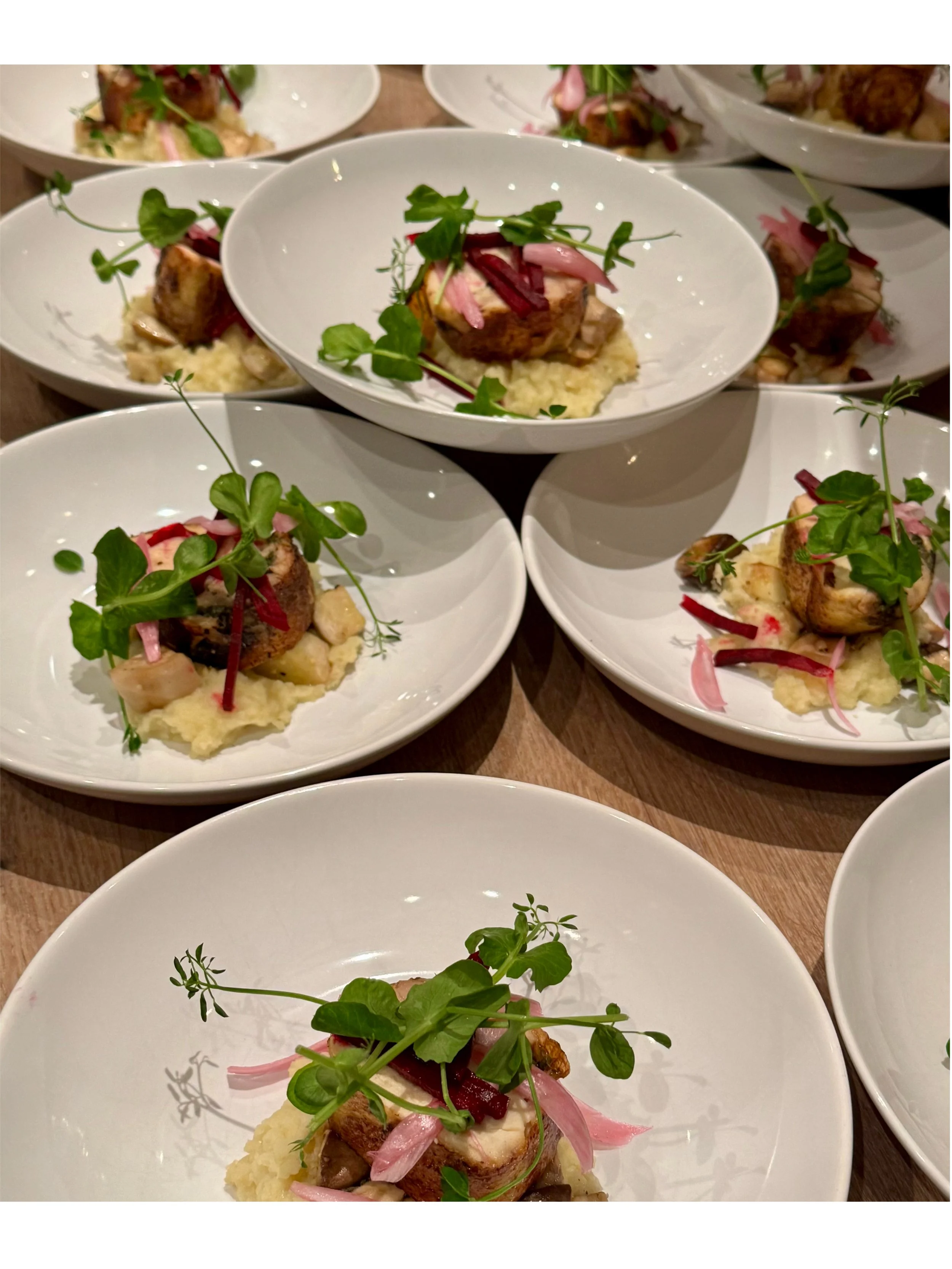 Seasonal main courses plated and ready to be served for an intimate private dining experience in Amsterdam.