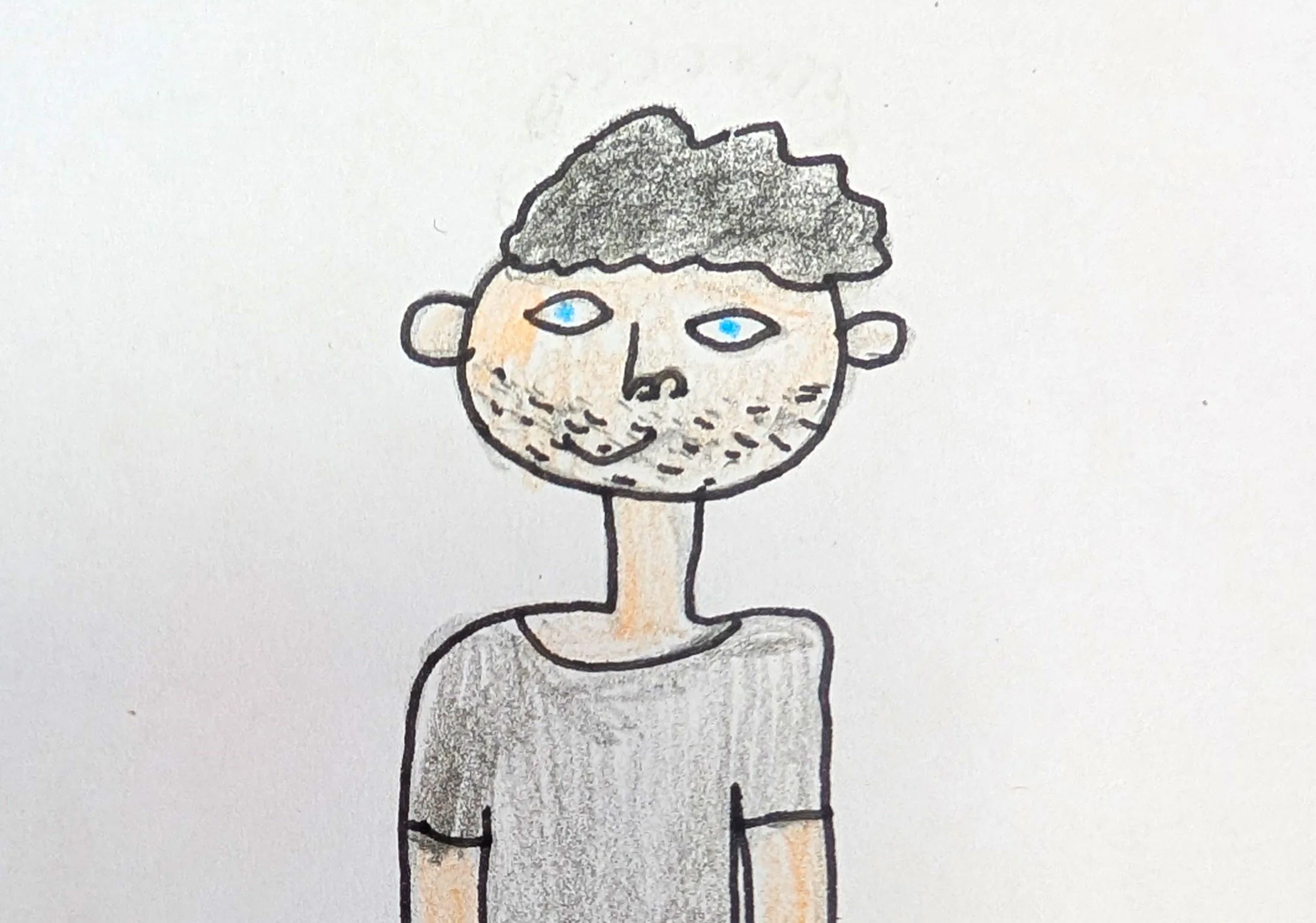 An image of Clyde, with short dark hair and stubble, and a dark tshirt. 