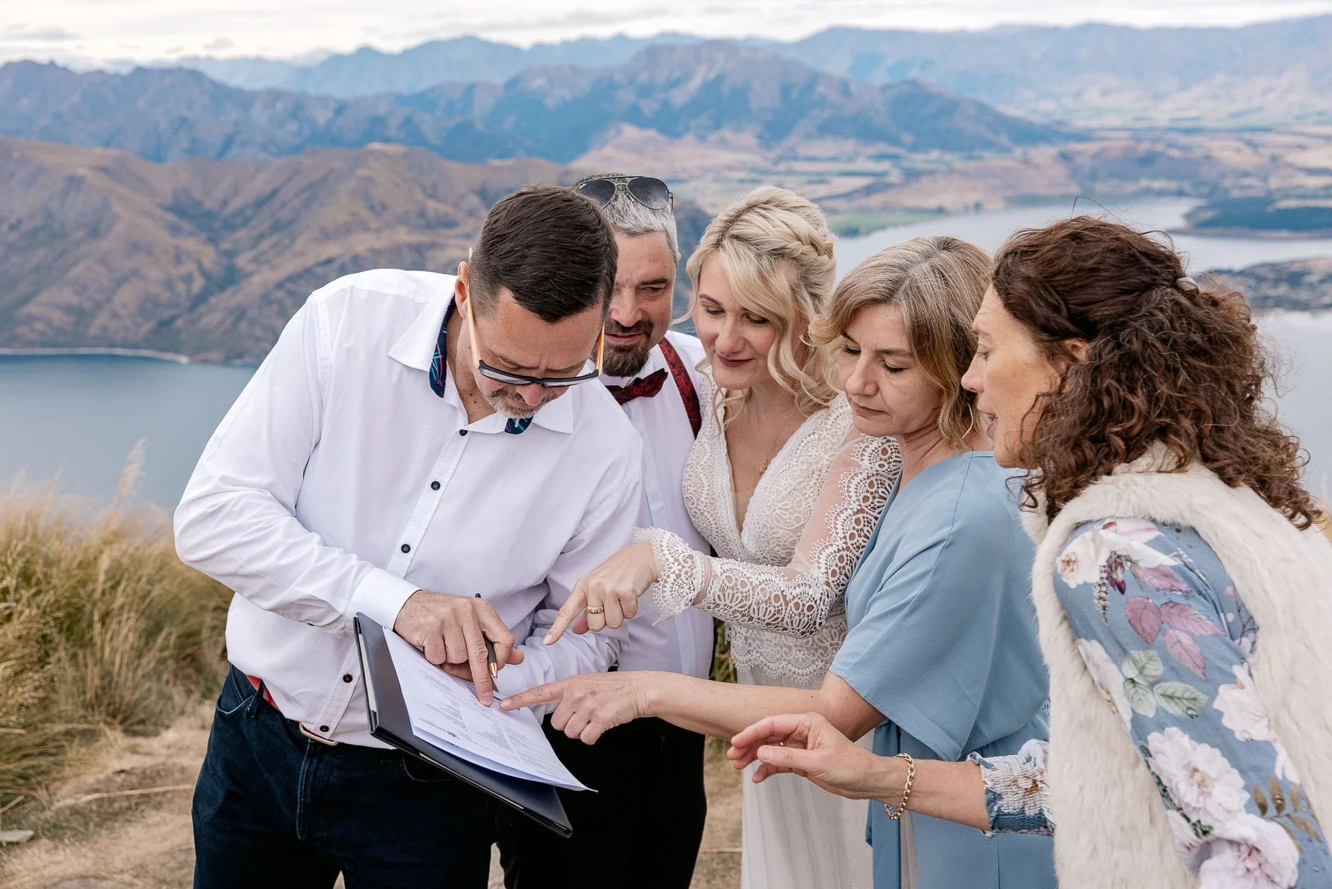Elena and Seb signing life away.jpg