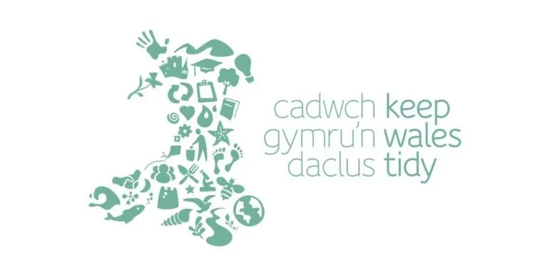 A graphic of a stylized foot made of various eco-friendly icons and symbols, with text promoting keeping Wales tidy.