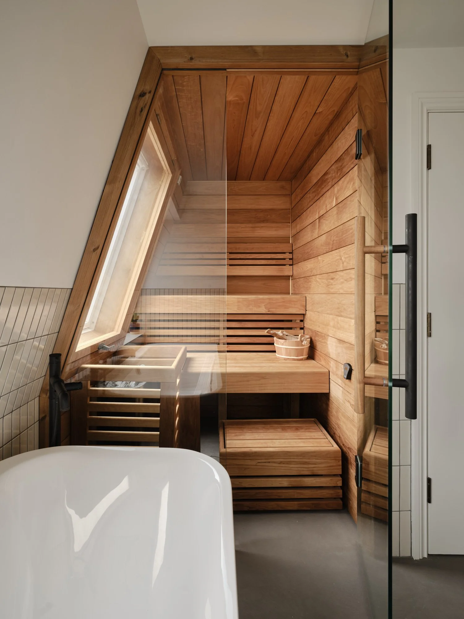 Home sauna with window with unique city views