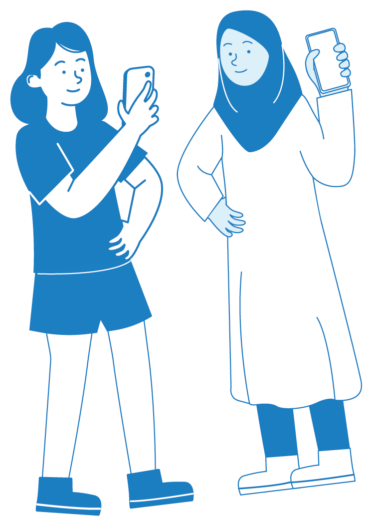 Two women taking selfies with their smartphones, one wearing casual clothes and the other wearing a traditional hijab and dress.