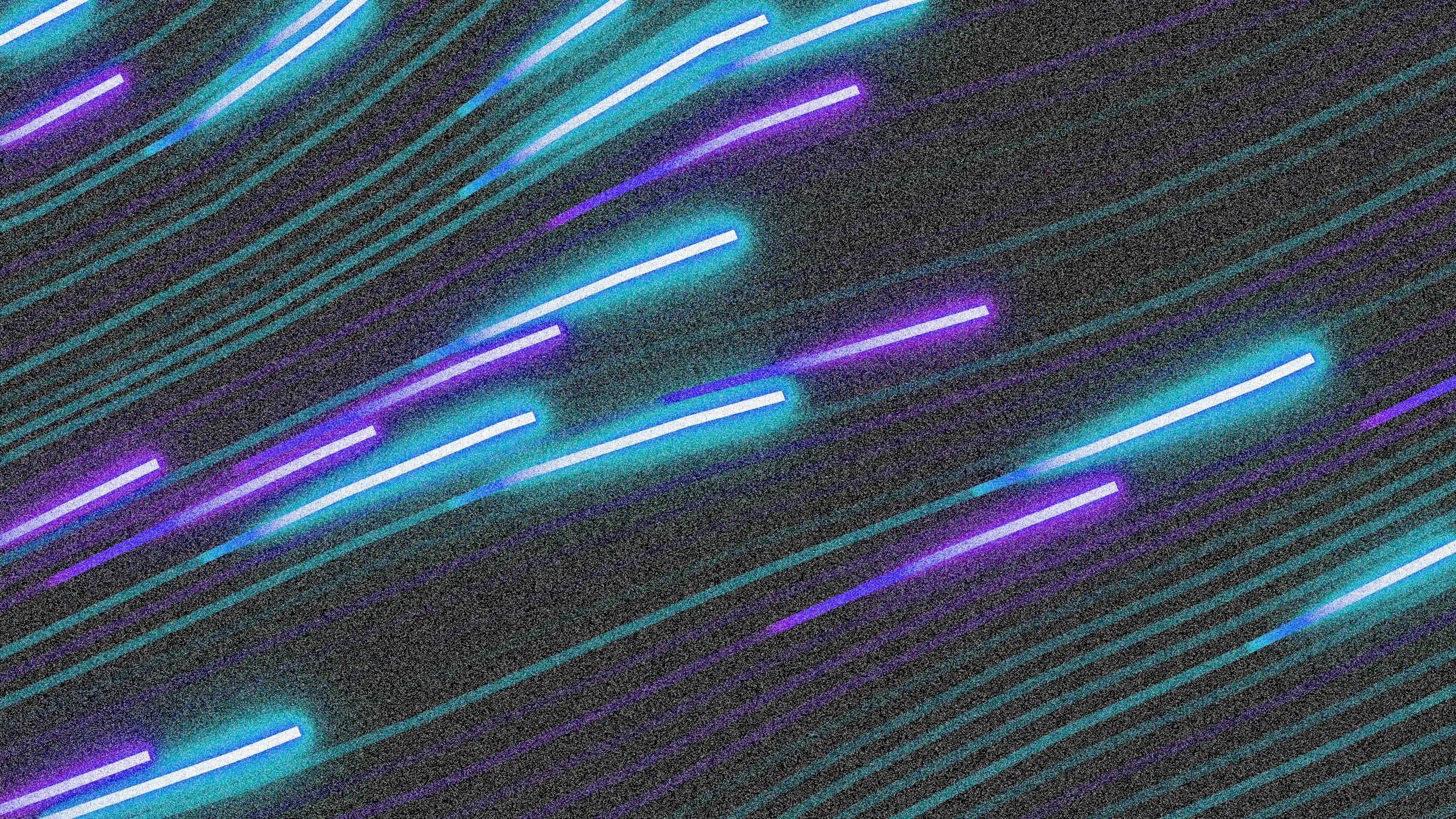 Neon light streaks in purple, blue, and white on a dark background.