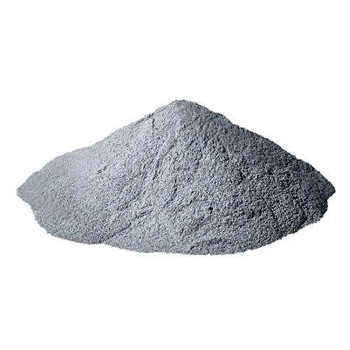 A pile of gray powdered substance on a white background.