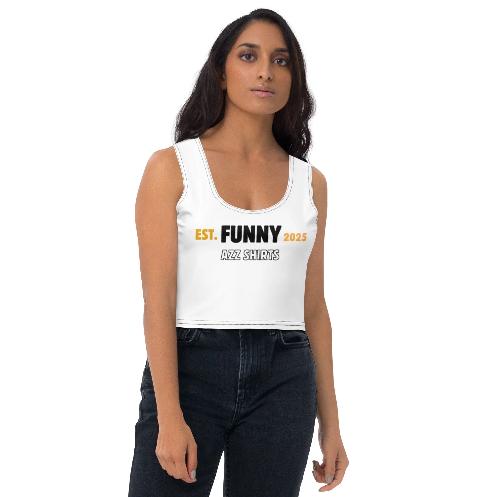 A woman wearing a white sleeveless crop top with the text "EST. FUNNY 2025 AZZ SHIRTS" and black jeans.