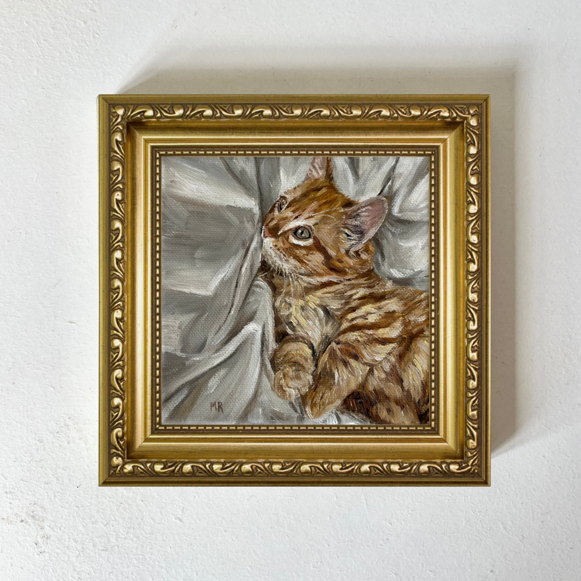 cat+mockup+gold+frame.png
