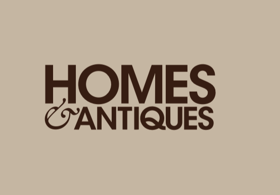 Logo for Homes & Antiques with beige background and brown text.