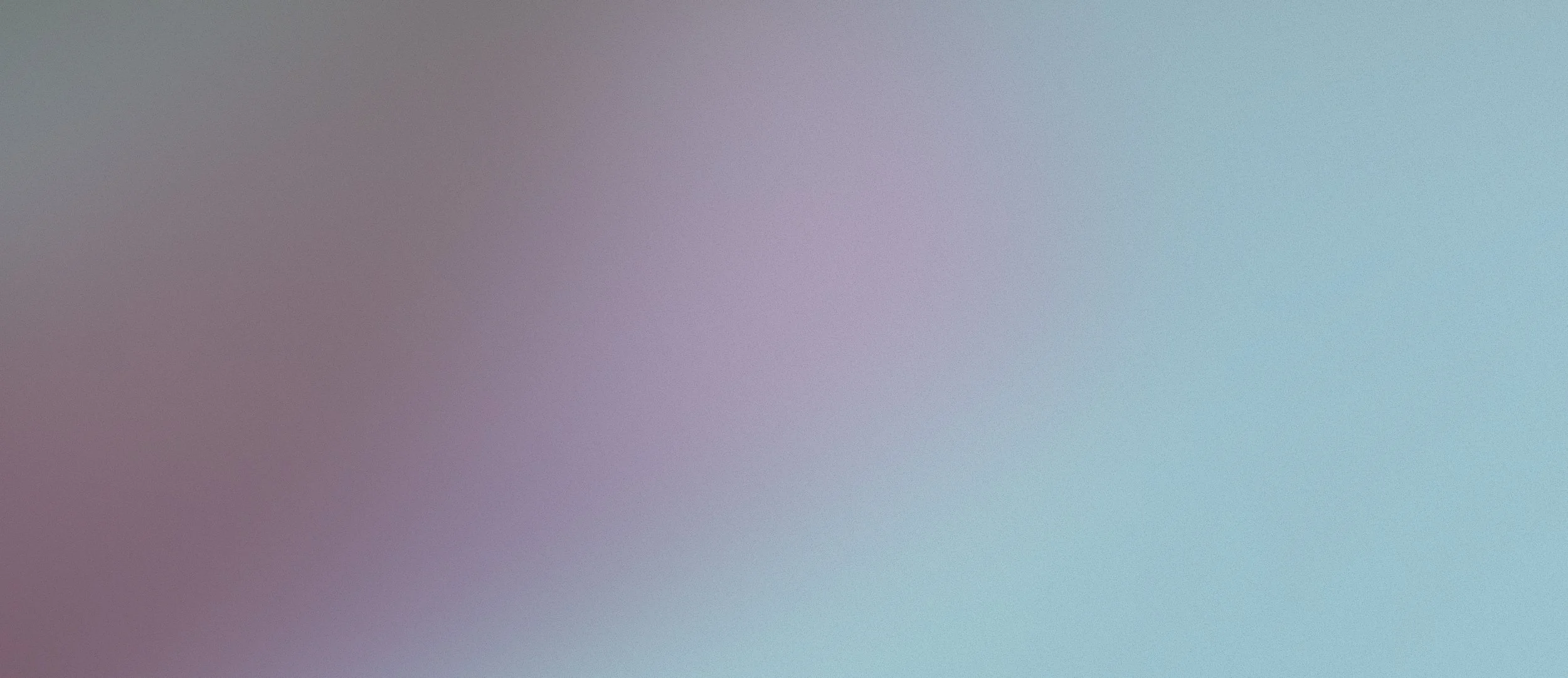 Blurred gradient background with shades of purple, gray, and teal.