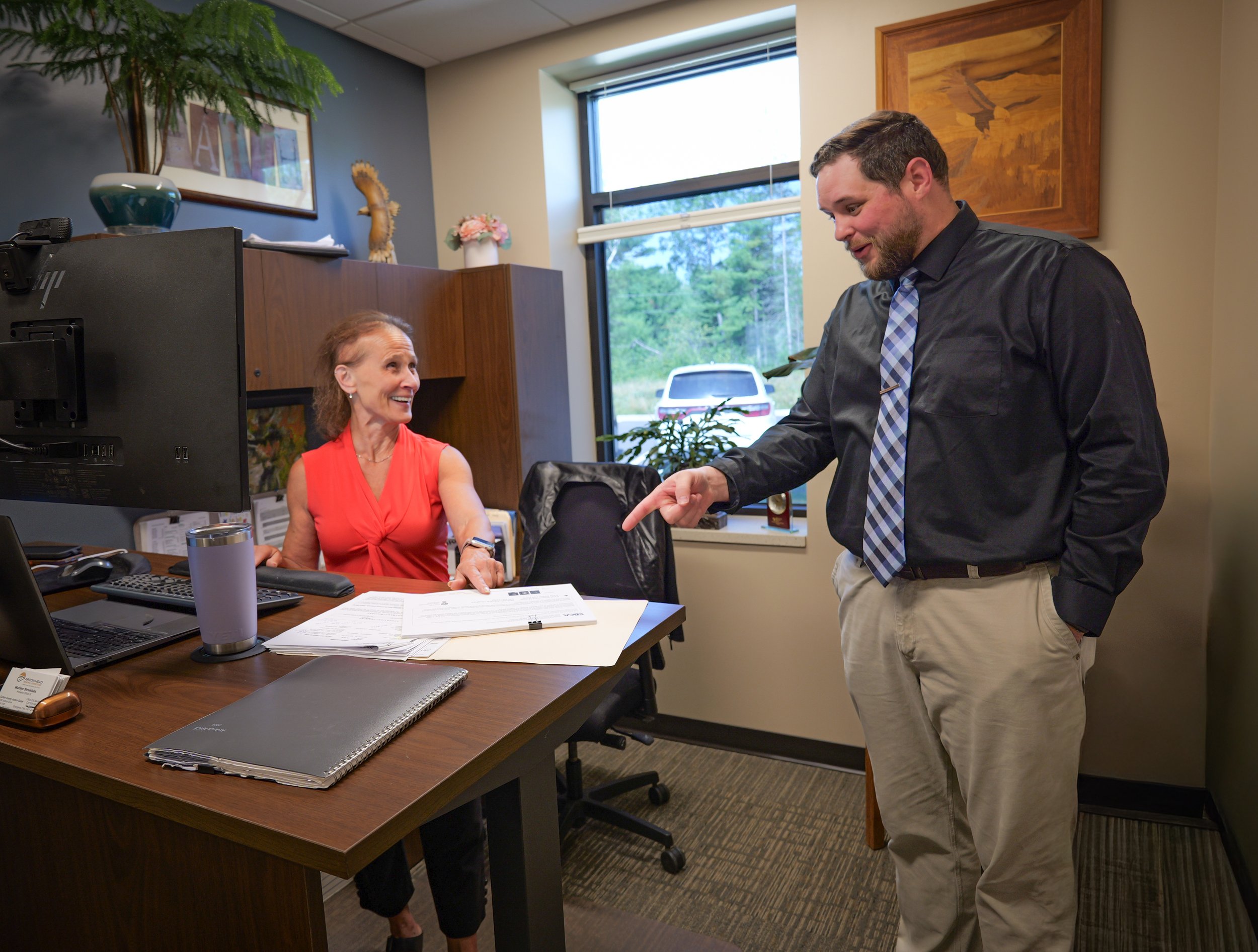Probation officers working together at the Carlton County offices of ARC
