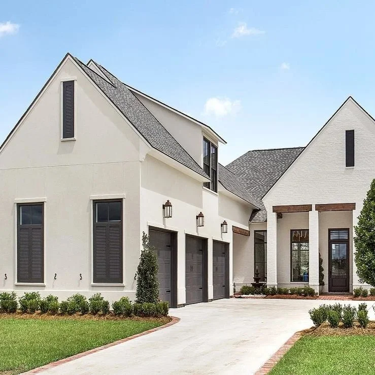 Modern Louisiana home with storm-damaged roof representing insurance claim disputes, adjuster inspections, and post-storm roofing assessment processes.