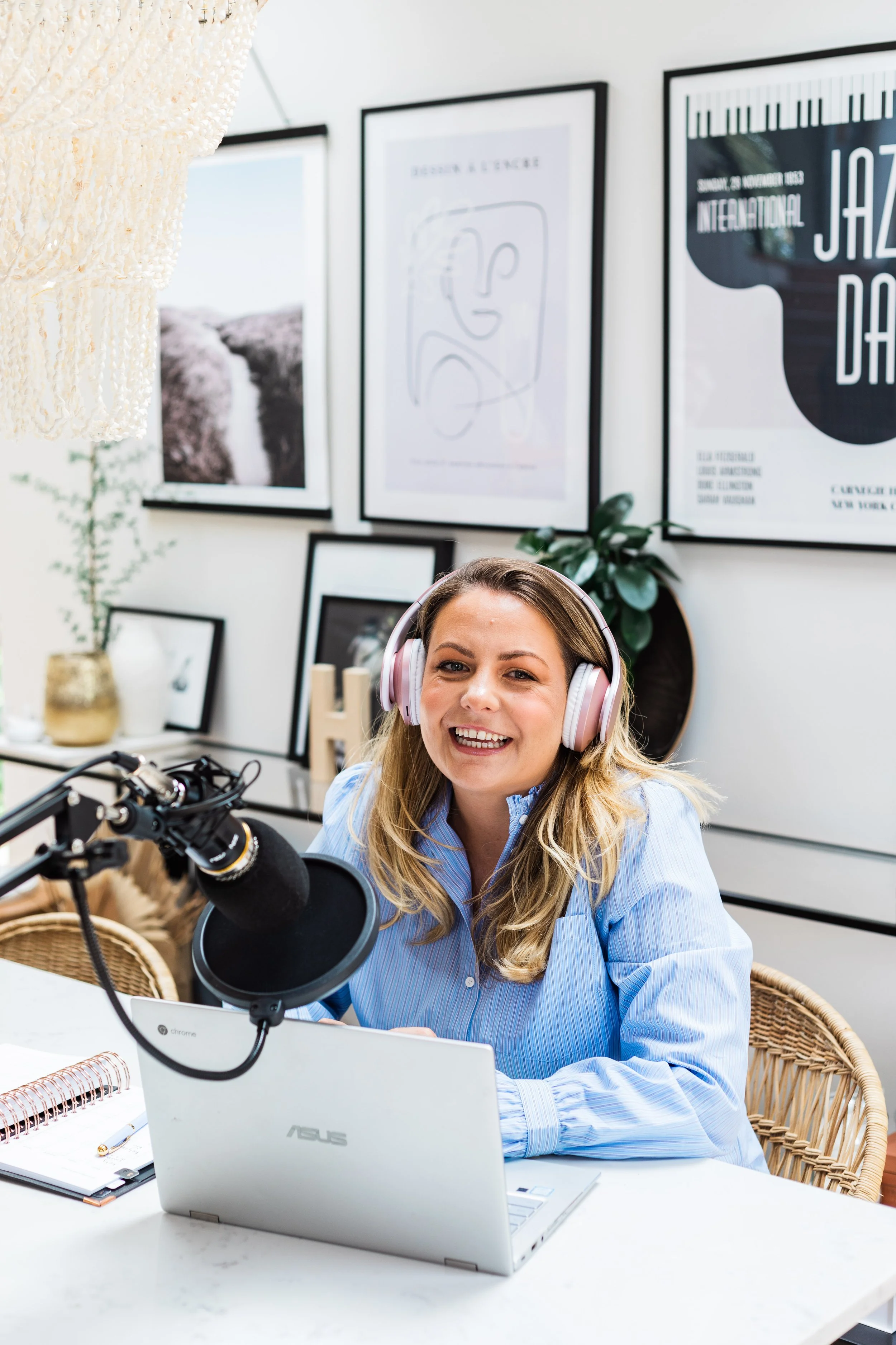 Baby sleep consultant Keri Rock recording an episode of the Sleepy Mums podcast in her home studio, sharing expert advice for tired parents.