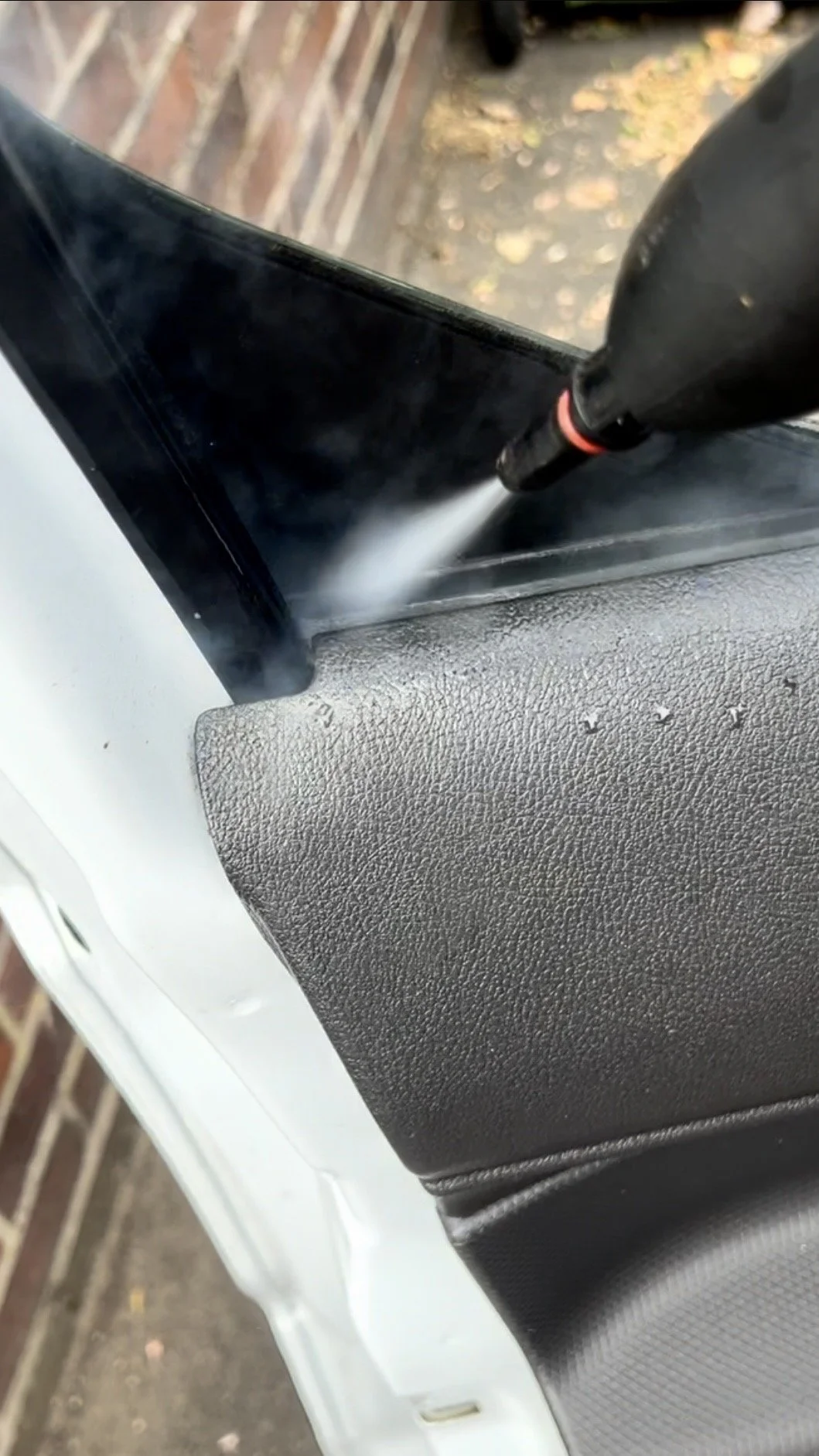 Steam cleaning and detailing a vehicles doors in Southport