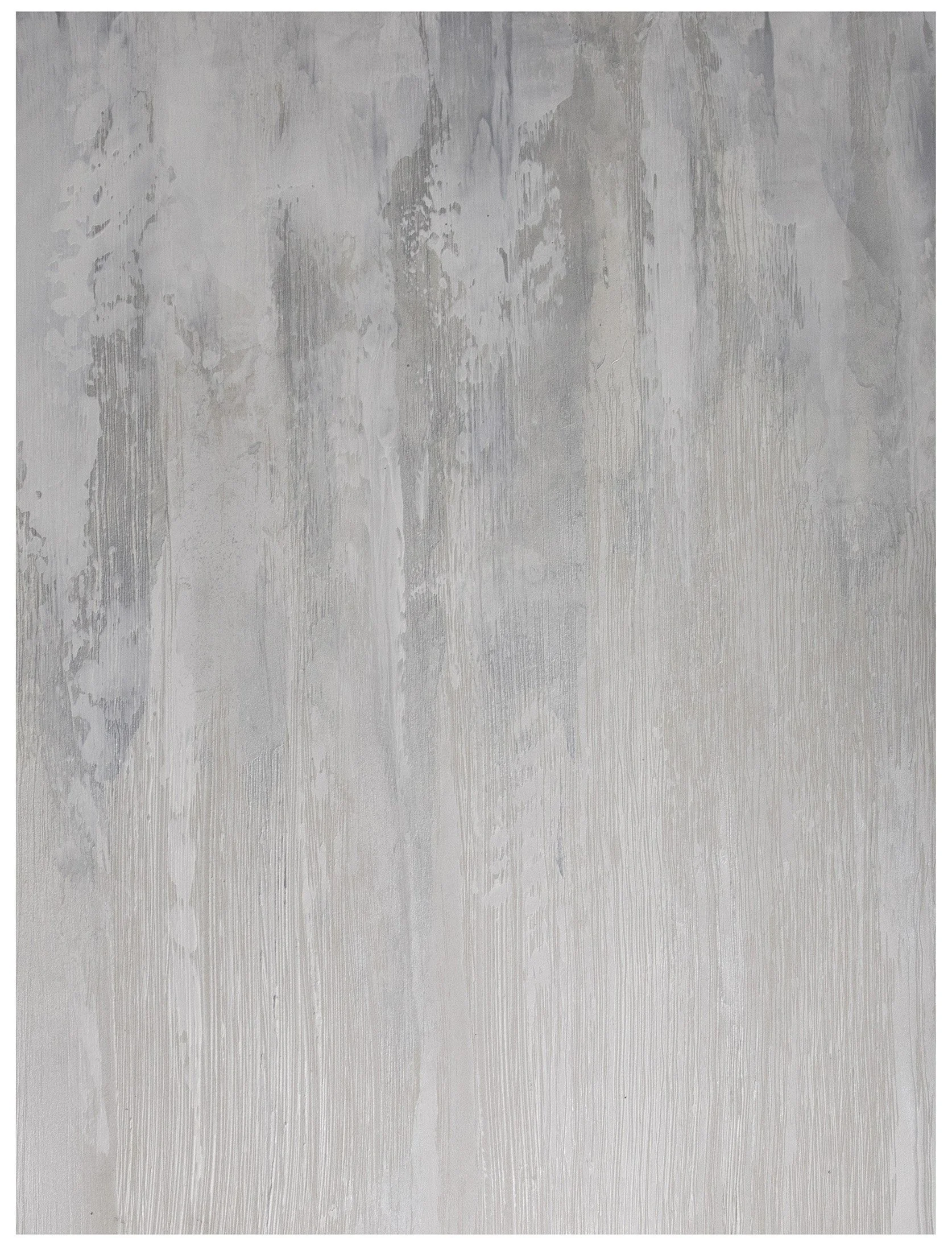 Close-up photograph of a textured wall with peeling paint in shades of gray and white.