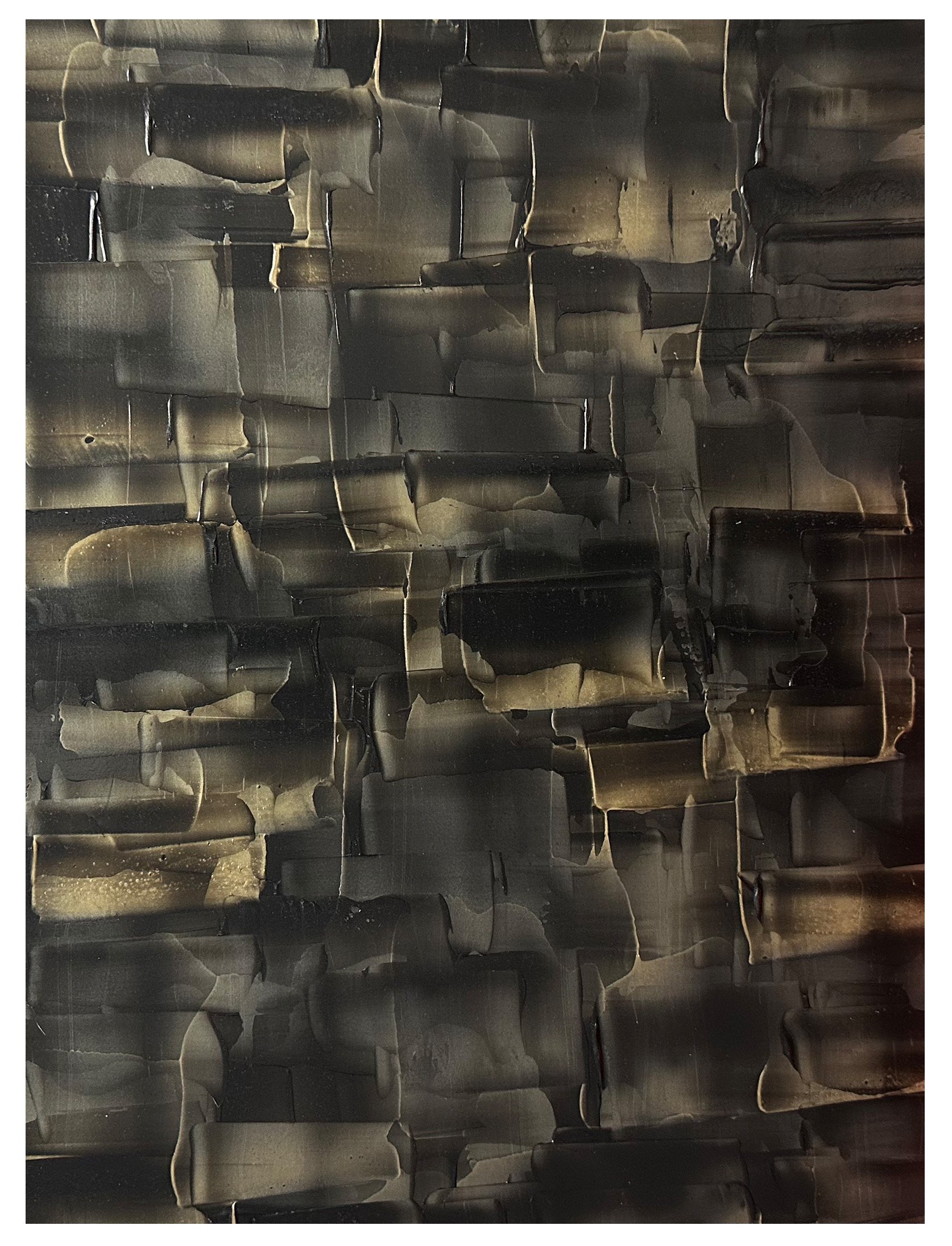 Abstract close-up of a textured surface in black, gray, and beige tones, resembling layered and cracked material.