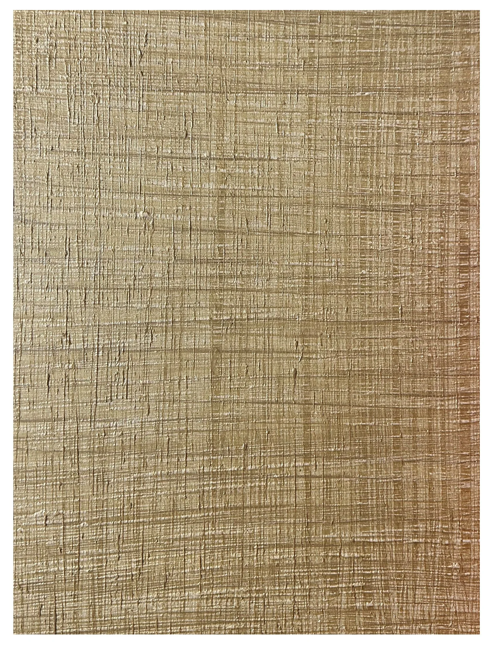 Close-up photograph of a light brown wooden surface with a textured, rough grain pattern.