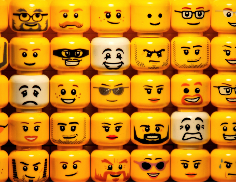 Lego heads all in a row, stacked