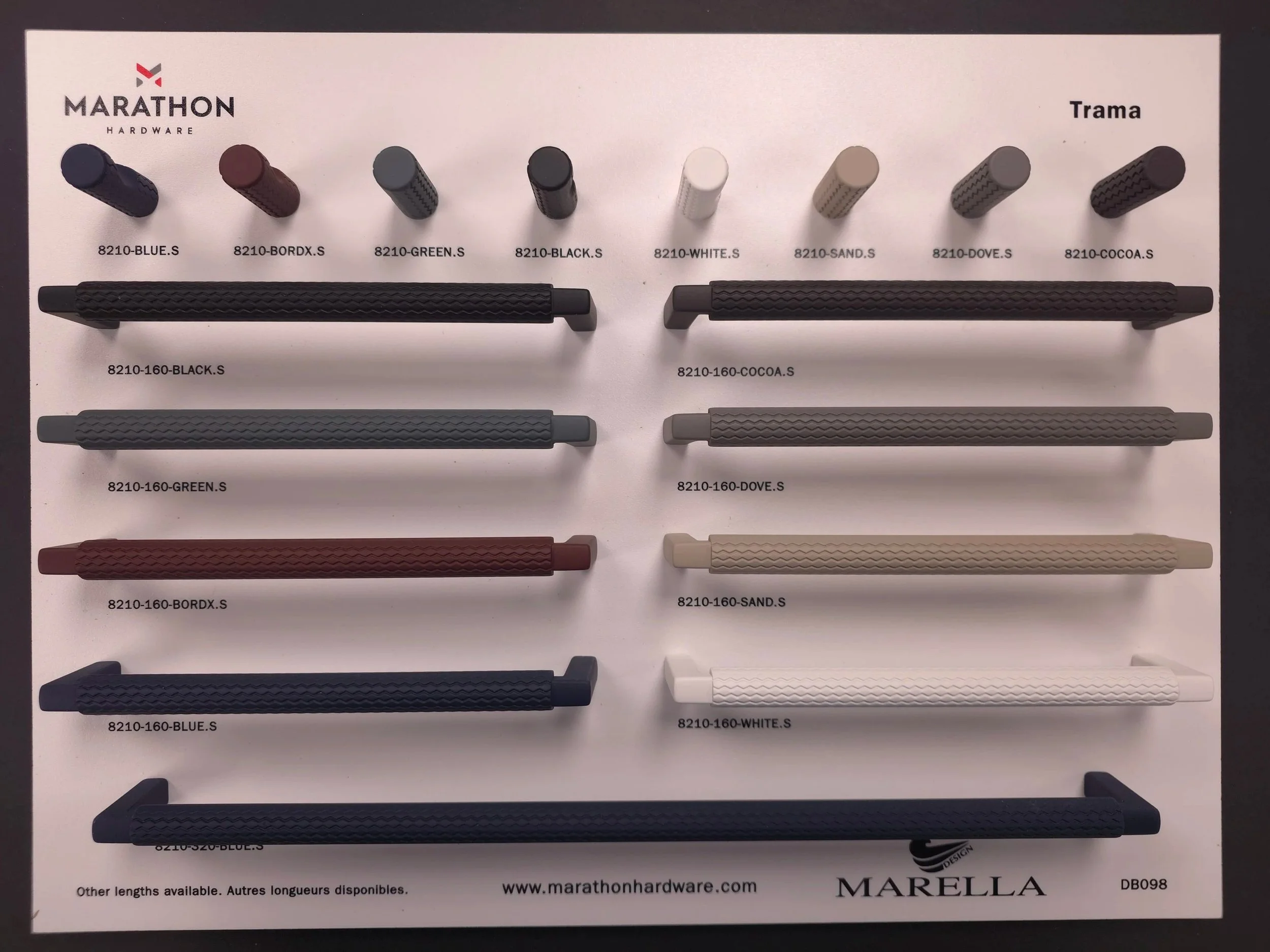 A collection of various metal cabinet or drawer handles in different finishes and designs, arranged on a black background.