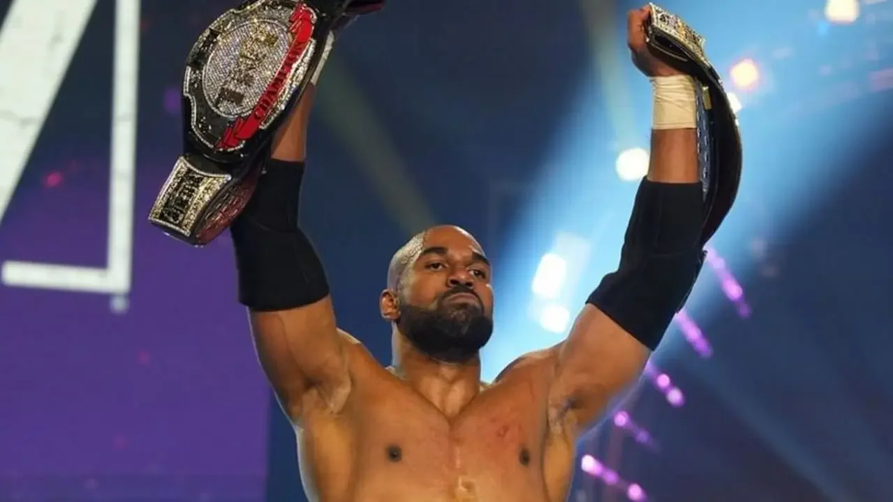 Former two-time AEW TNT Champion Scorpio Sky celebrating a title victory in the wrestling ring