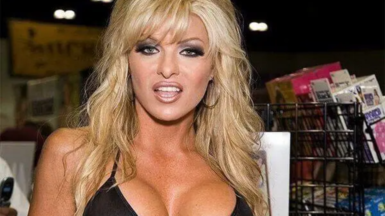 Former WCW wrestler Major Gunns (Tylene Buck) posing at a convention appearance.