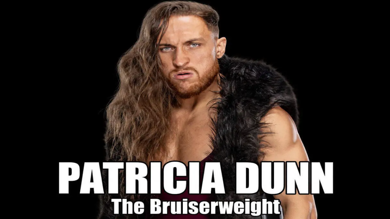 Wrestling star Pete Dunne with long hair and fur vest, overlaid with bold text reading “PATRICIA DUNN The Bruiserweight” in a satirical name-swap graphic referencing the “transitioning” comment.