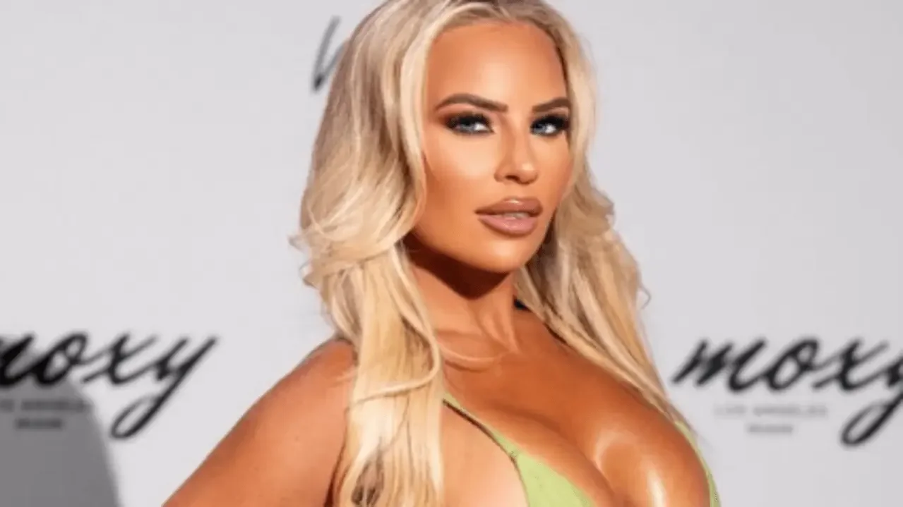 "Ash By Elegance posing confidently in lime green bikini, blonde hair"