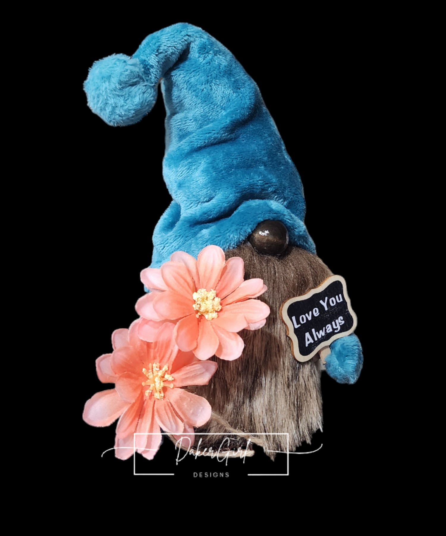 A stuffed gnome with a tall, floppy blue hat, holding pink flowers and a sign that says "Love You Always".