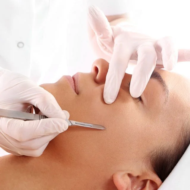 Dermaplaning on face